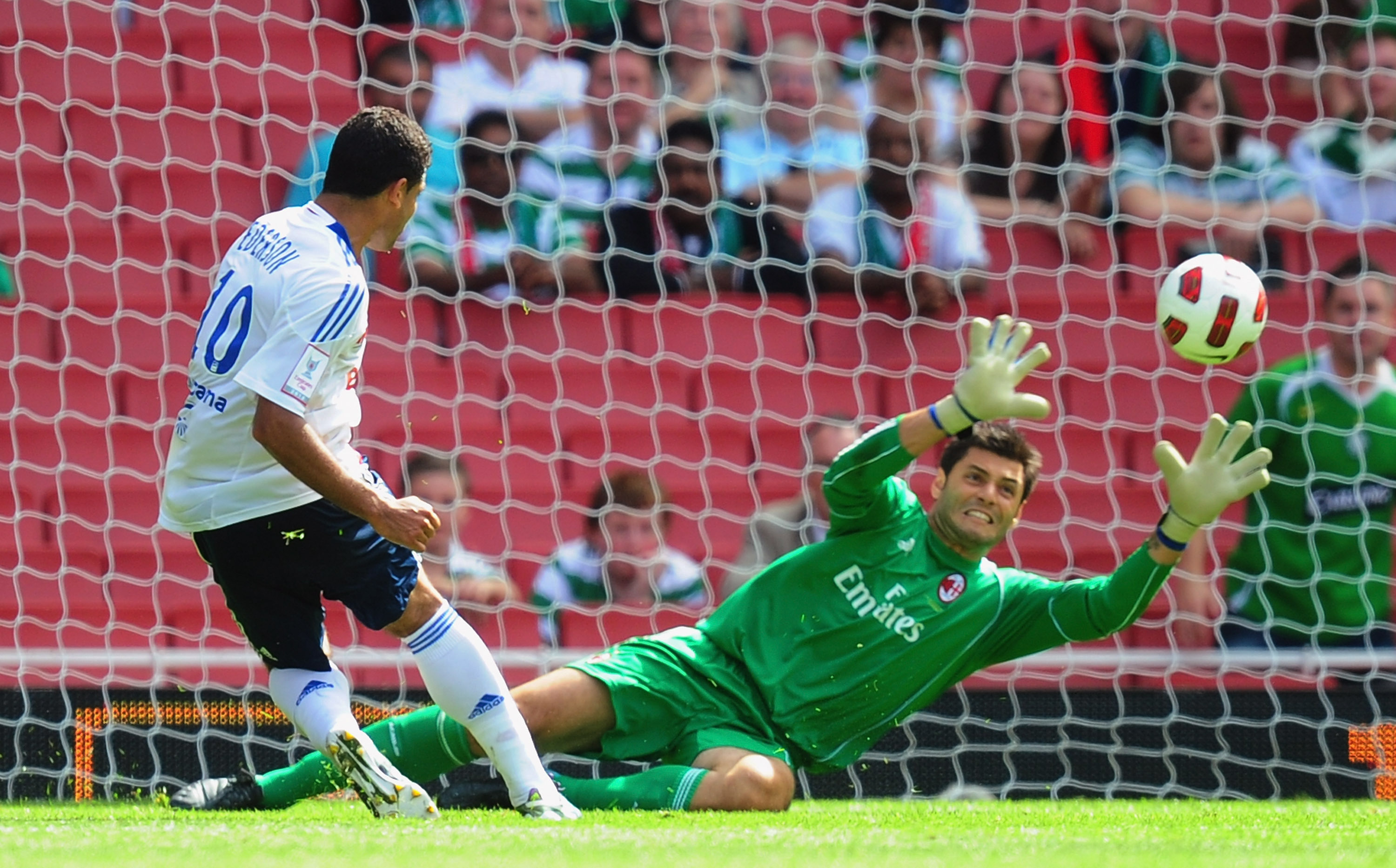 LONDON, ENGLAND - AUGUST 01:  Ederson of Lyon hits the bar as Marco Amelia of AC Milan dives during the Emirates Cup match between AC Milan and Lyon at Emirates Stadium on August 1, 2010 in London, England.  (Photo by Mike Hewitt/Getty Images)