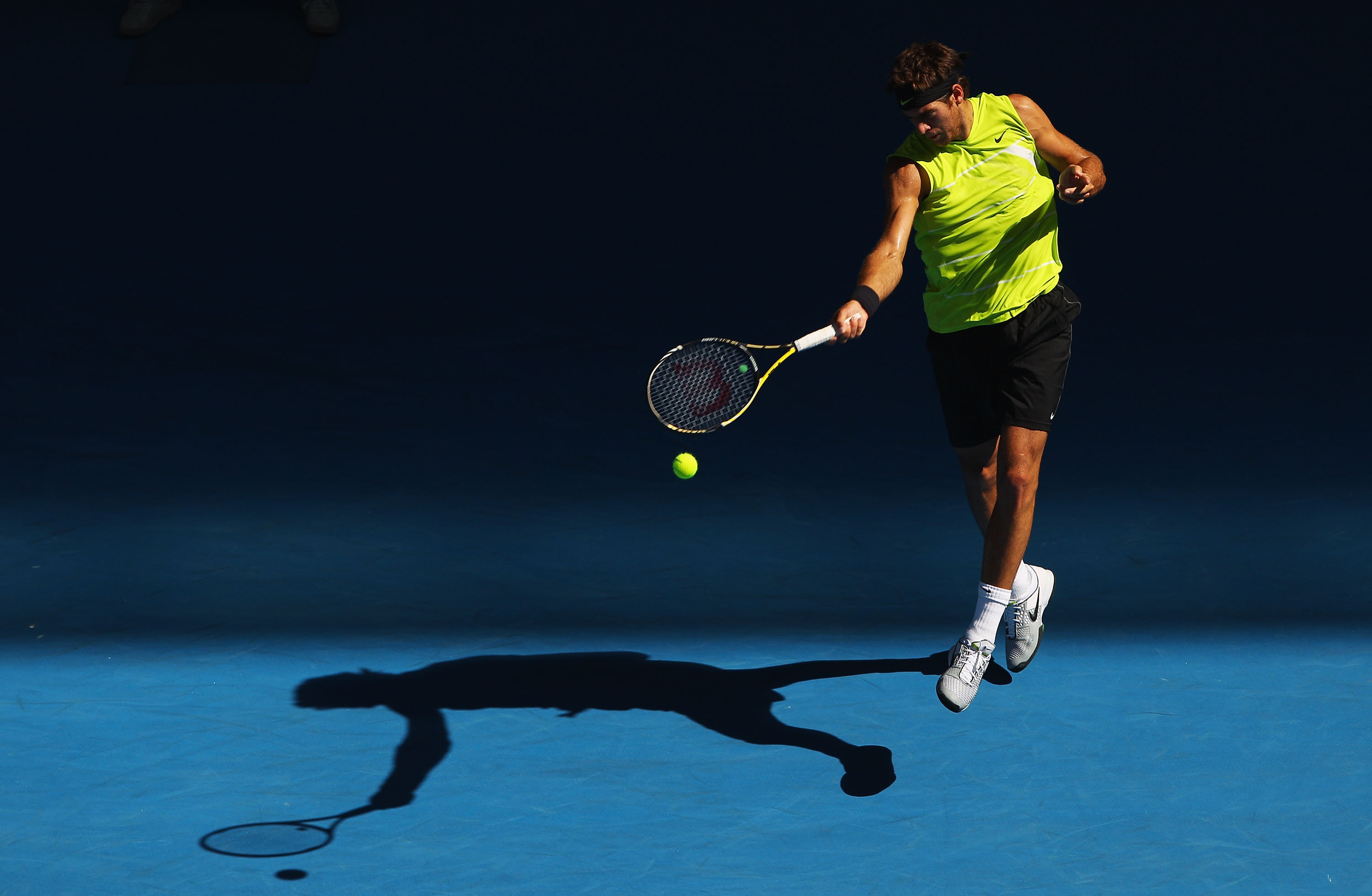 MELBOURNE, AUSTRALIA - JANUARY 24:  Juan Martin Del Potro of Argentina plays a forehand in his fourth round match against Marin Cilic of Croatia during day seven of the 2010 Australian Open at Melbourne Park on January 24, 2010 in Melbourne, Australia.  (