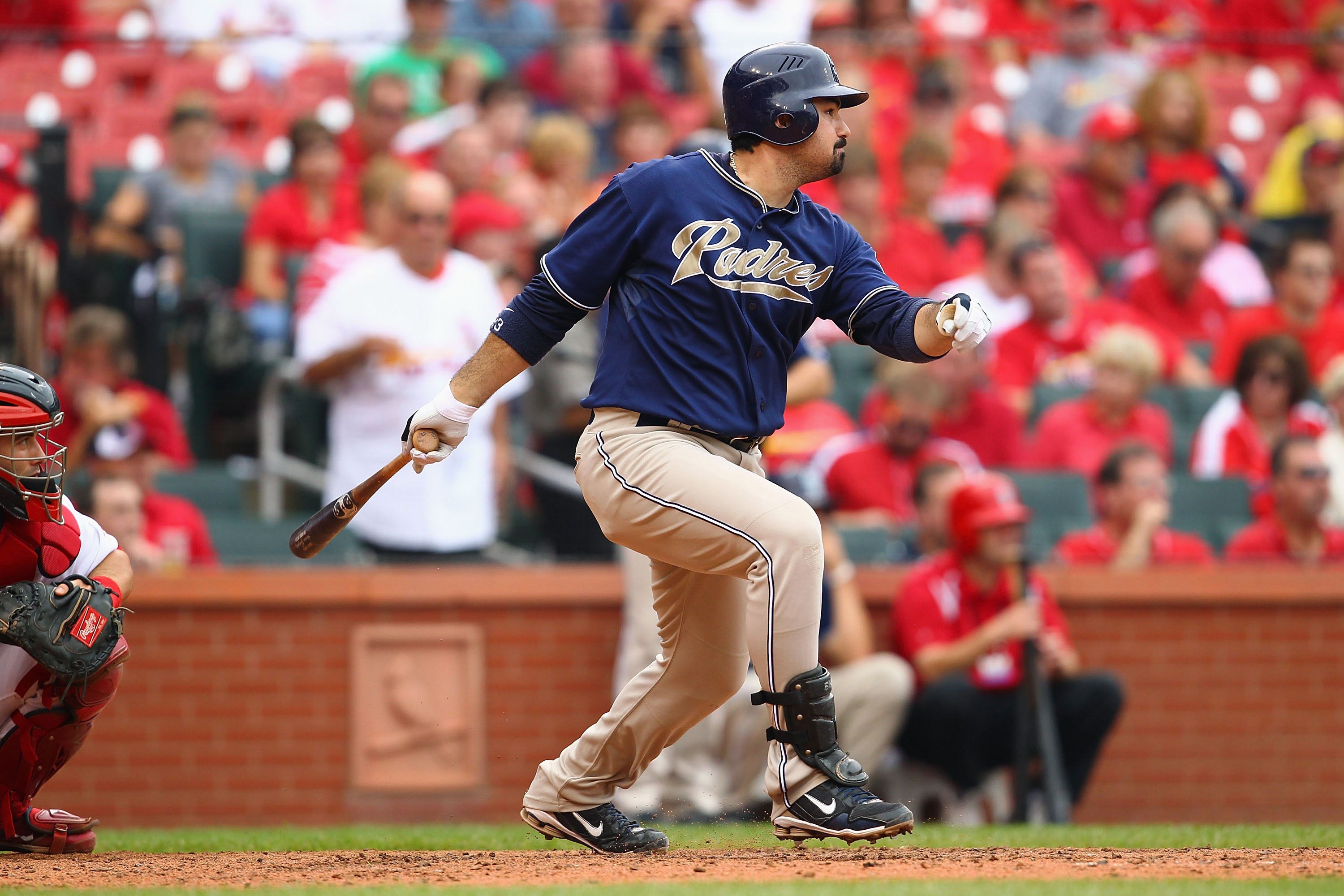 ST. LOUIS - SEPTEMBER 19: Adrian Gonzalez #23 of the San Diego Padres hits an RBI single against the St. Louis Cardinals at Busch Stadium on September 19, 2010 in St. Louis, Missouri.  The Cardinals beat the Padres 4-1.  (Photo by Dilip Vishwanat/Getty Im