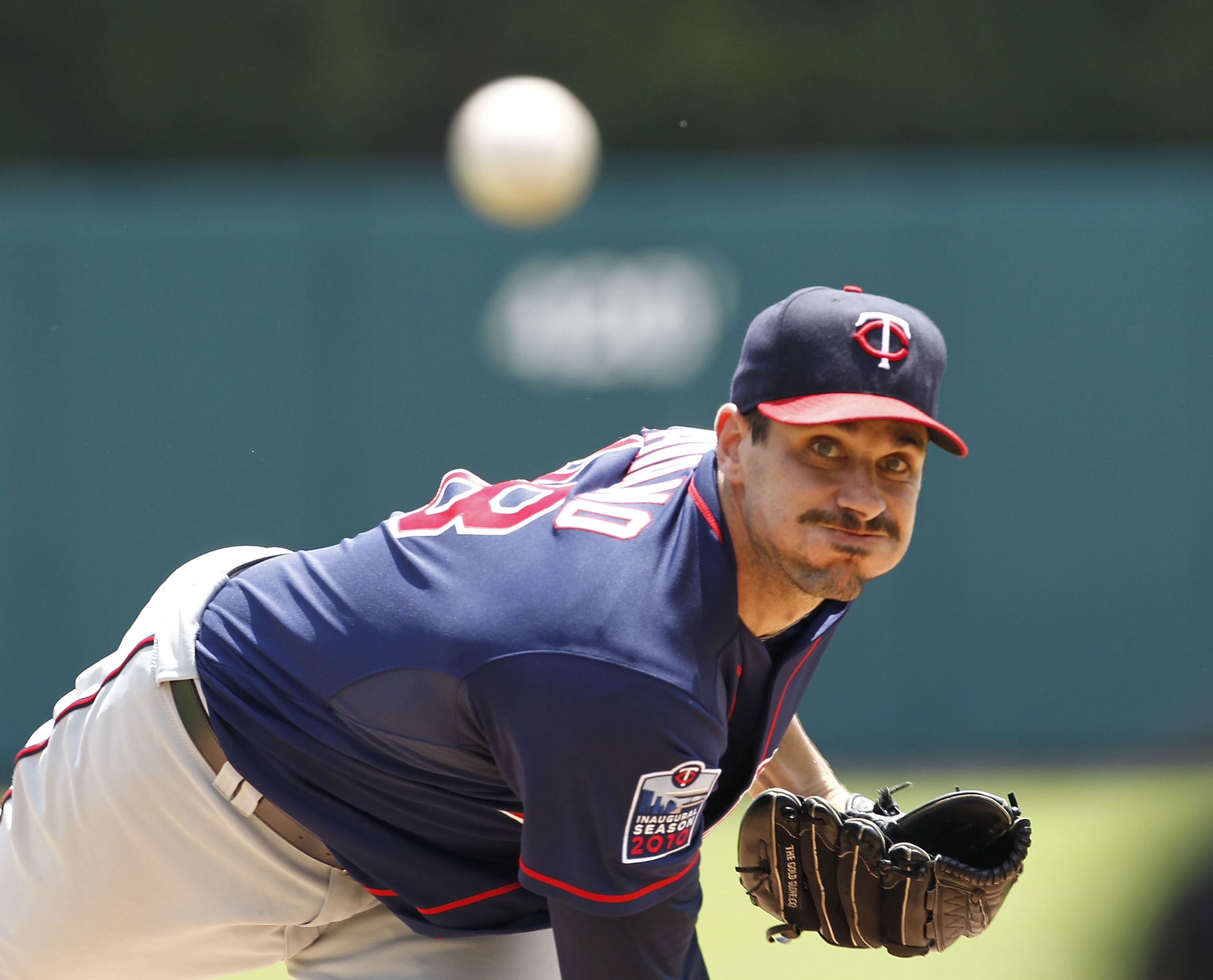DETROIT - JULY 11:  Carl Pavano #48 of the Minnesota Twins warms up prior to the start of the game against the Detroit Tigers on July 11, 2010 at Comerica Park in Detroit, Michigan.  (Photo by Leon Halip/Getty Images)