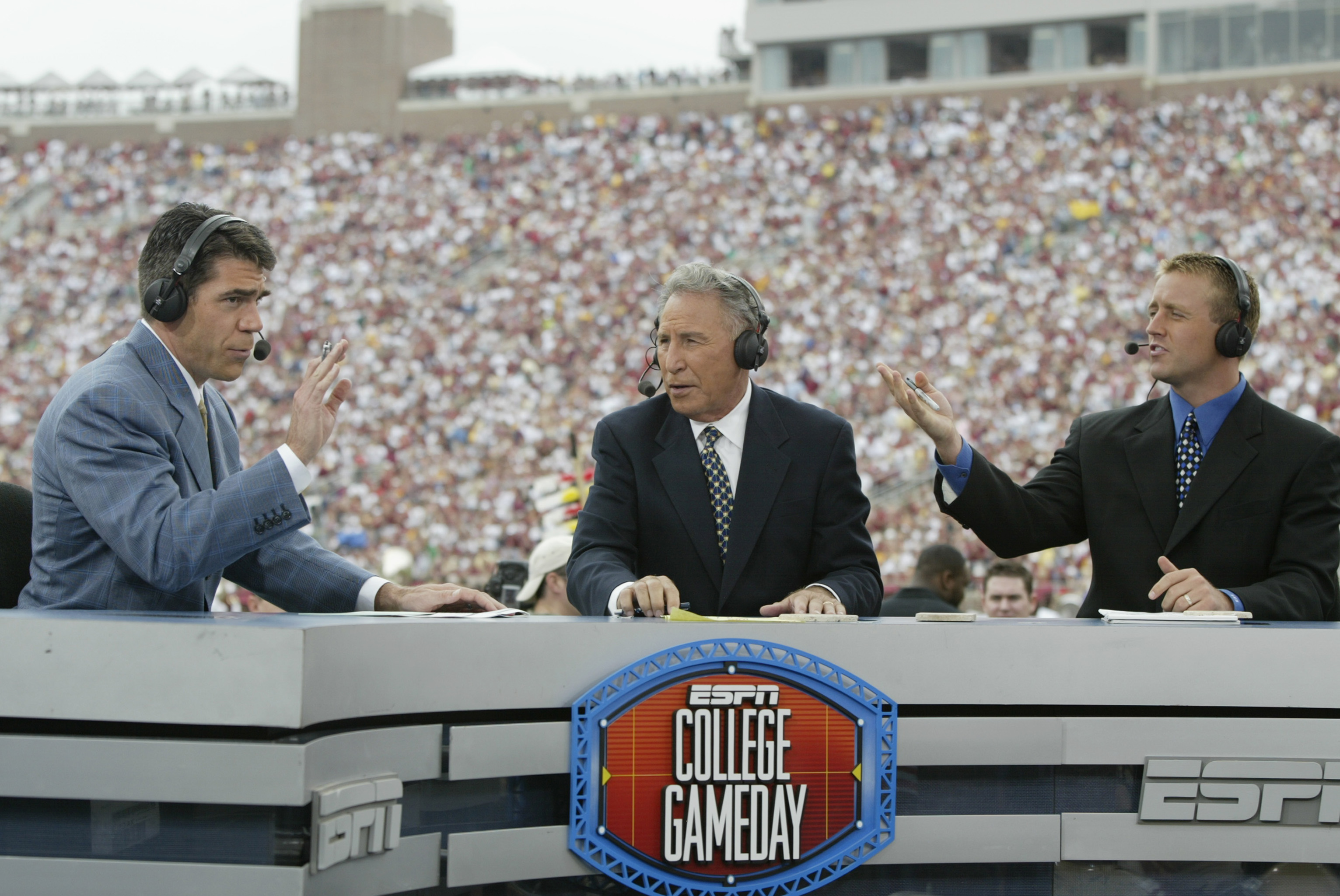 TALLAHASSEE, FL - OCTOBER 26: ESPN College GameDay announcers (l to r) Chris Fowler, Lee Corso and Kirk Herbstreit comment during the NCAA football game between Notre Dame and Florida State at Doak Campbell Stadium on October 26, 2002 in Tallahassee, Flo
