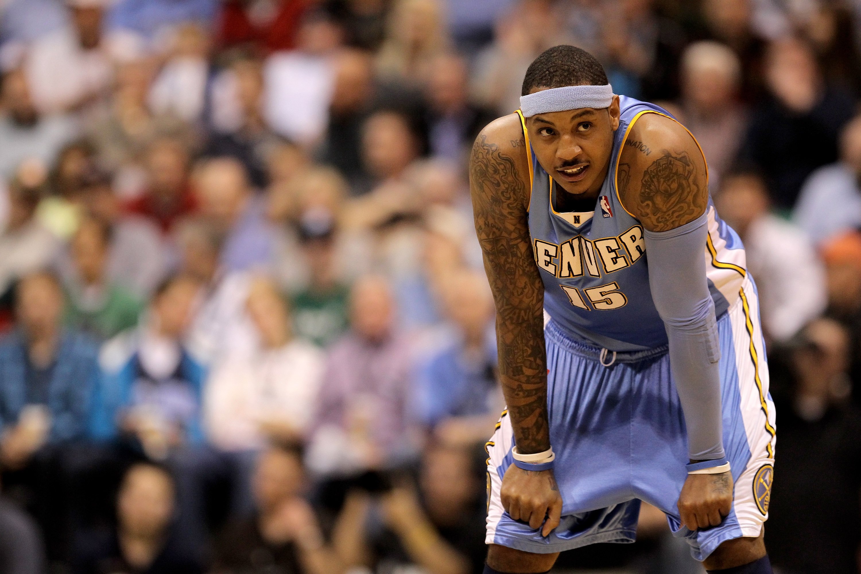 Carmelo Anthony of the Denver Nuggets stands on the court during