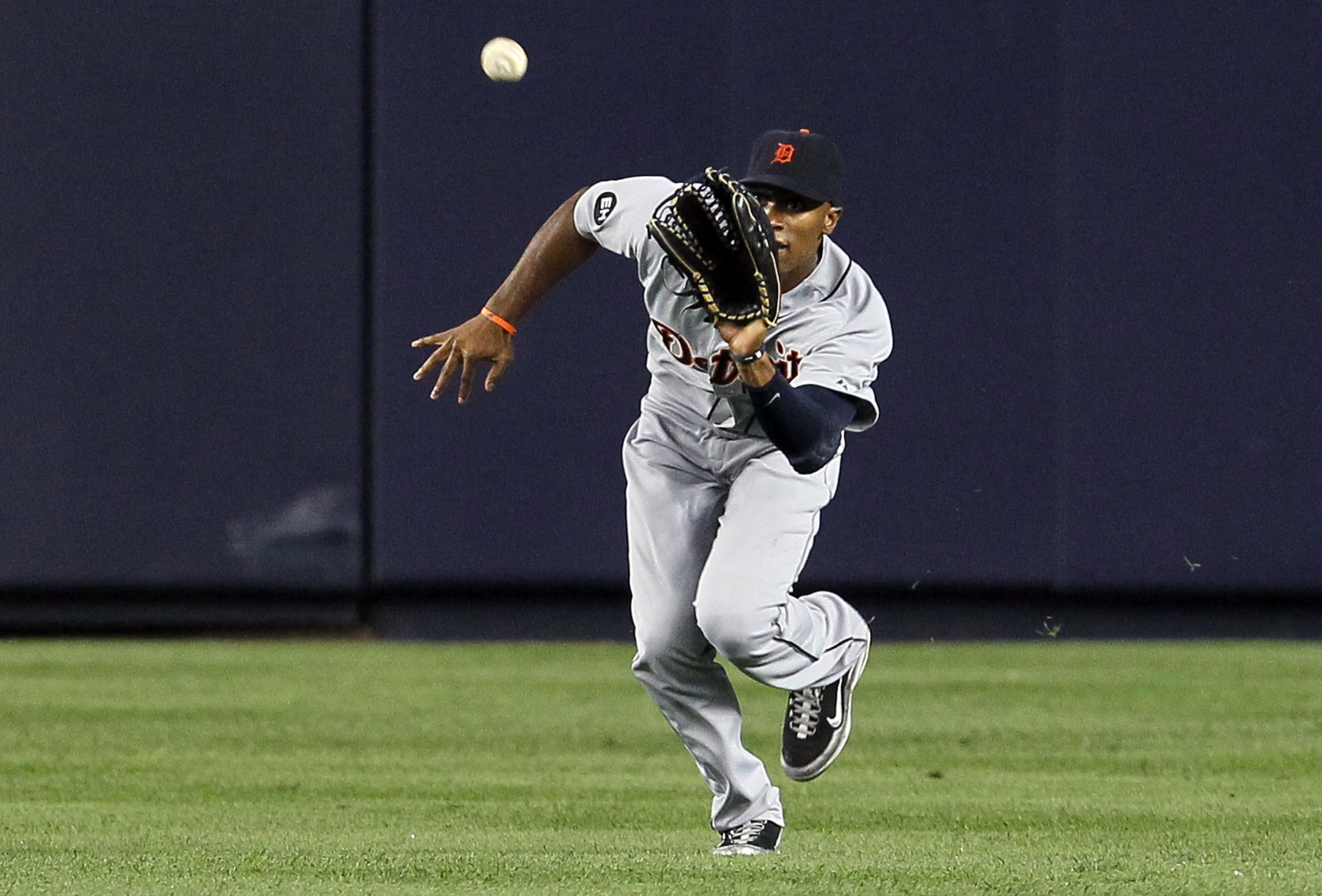NEW YORK - AUGUST 16:  Austin Jackson #14 of the Detroit Tigers makes a catch for an out against the New York Yankees on August 16, 2010 at Yankee Stadium in the Bronx borough of New York City.  (Photo by Jim McIsaac/Getty Images)