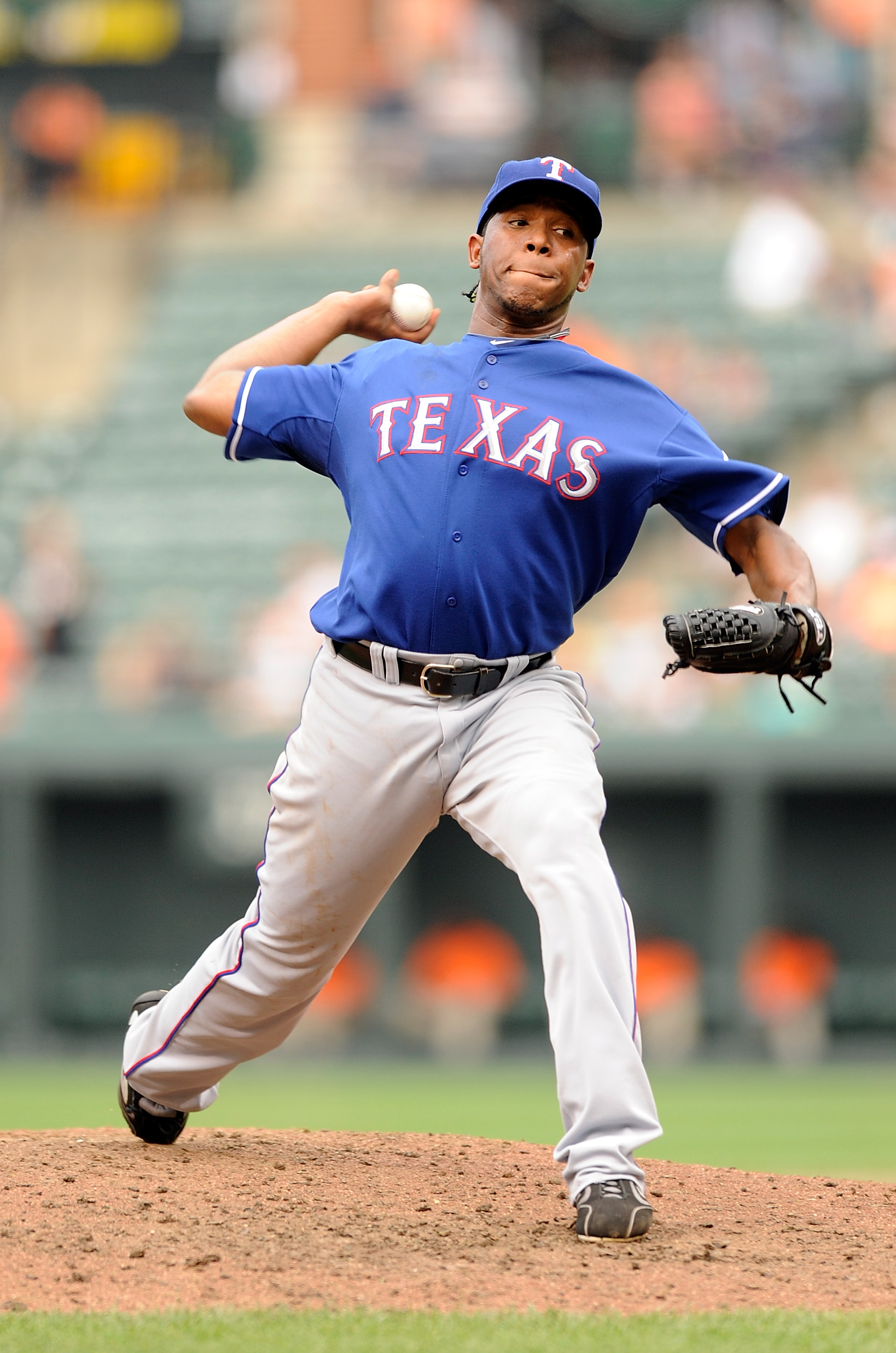BALTIMORE - AUGUST 22:  Neftali Feliz #30 of the Texas Rangers pitches against the Baltimore Orioles at Camden Yards on August 22, 2010 in Baltimore, Maryland. The Rangers beat the Orioles 6-4.  (Photo by Greg Fiume/Getty Images)