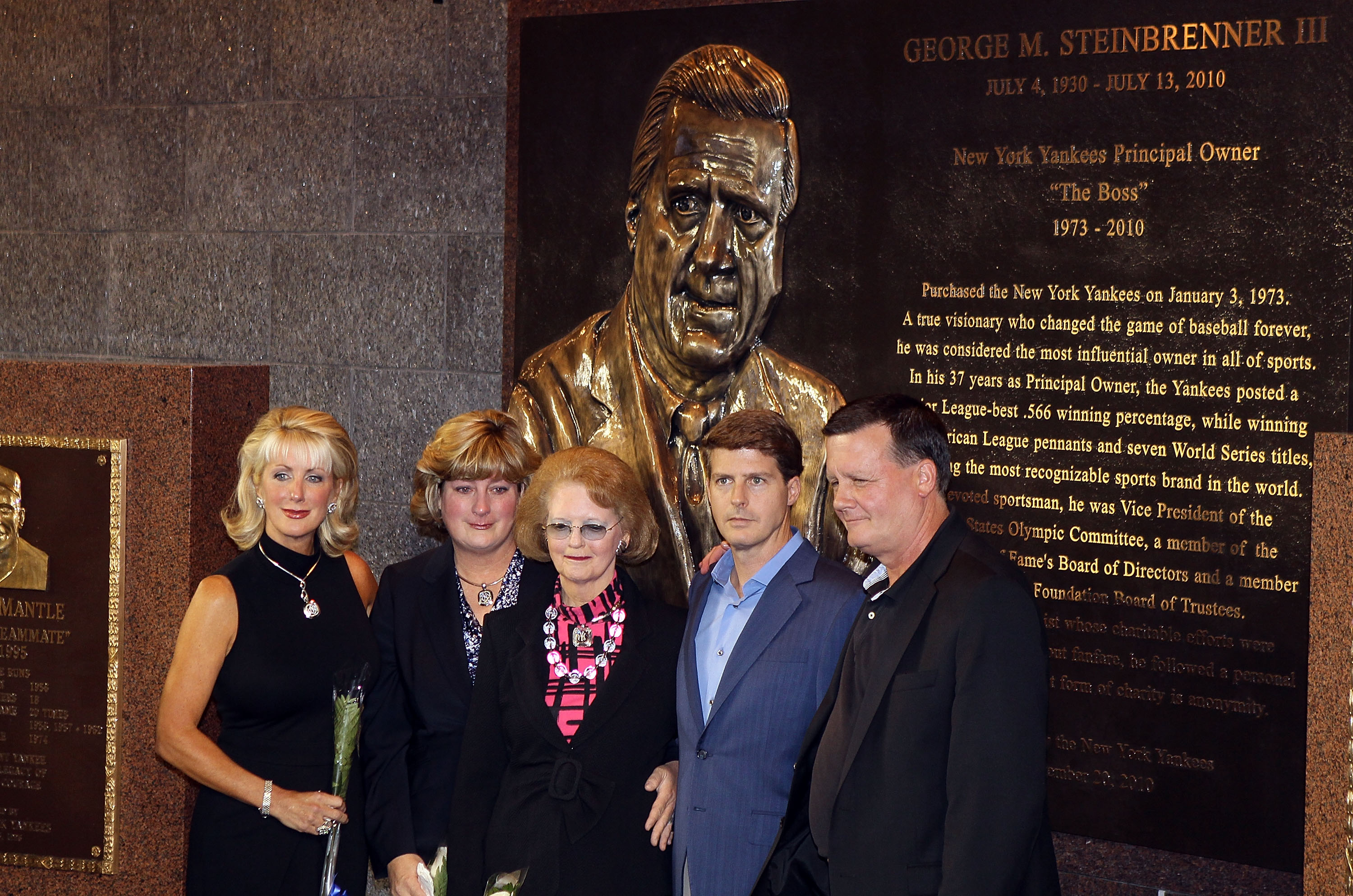 NEW YORK - SEPTEMBER 20:  The family of late New York Yankees owner George Steinbrenner poses in front of the newly unveiled monument prior to game against the Tampa Bay Rays on September 20, 2010 at Yankee Stadium in the Bronx borough of New York City.