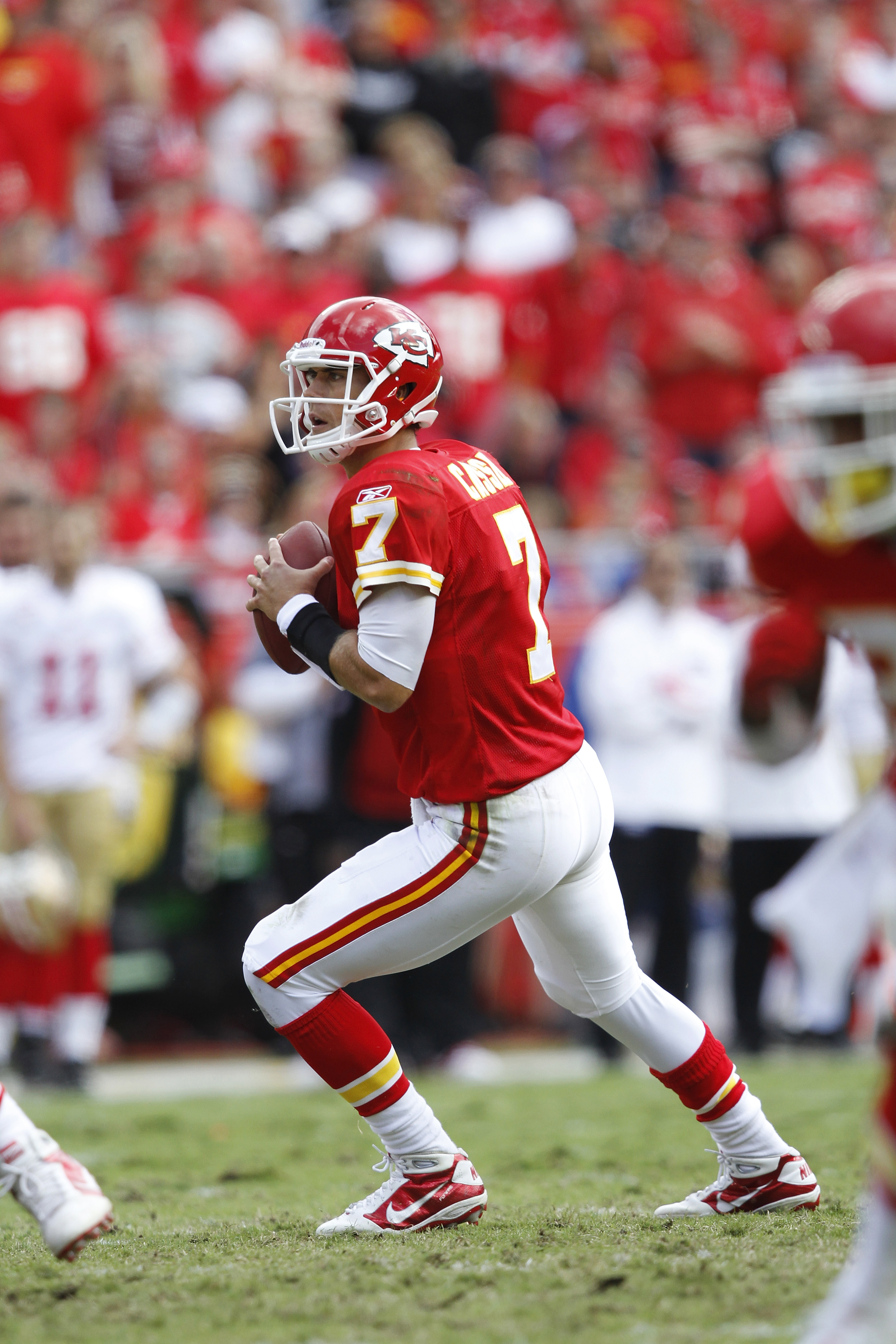 Buffalo Bills quarterback Ryan Fitzpatrick (14) ends up at the pile during  the NFL football game between the Kansas City Chiefs and the Buffalo Bills  at Arrowhead Stadium in Kansas City, Missouri.