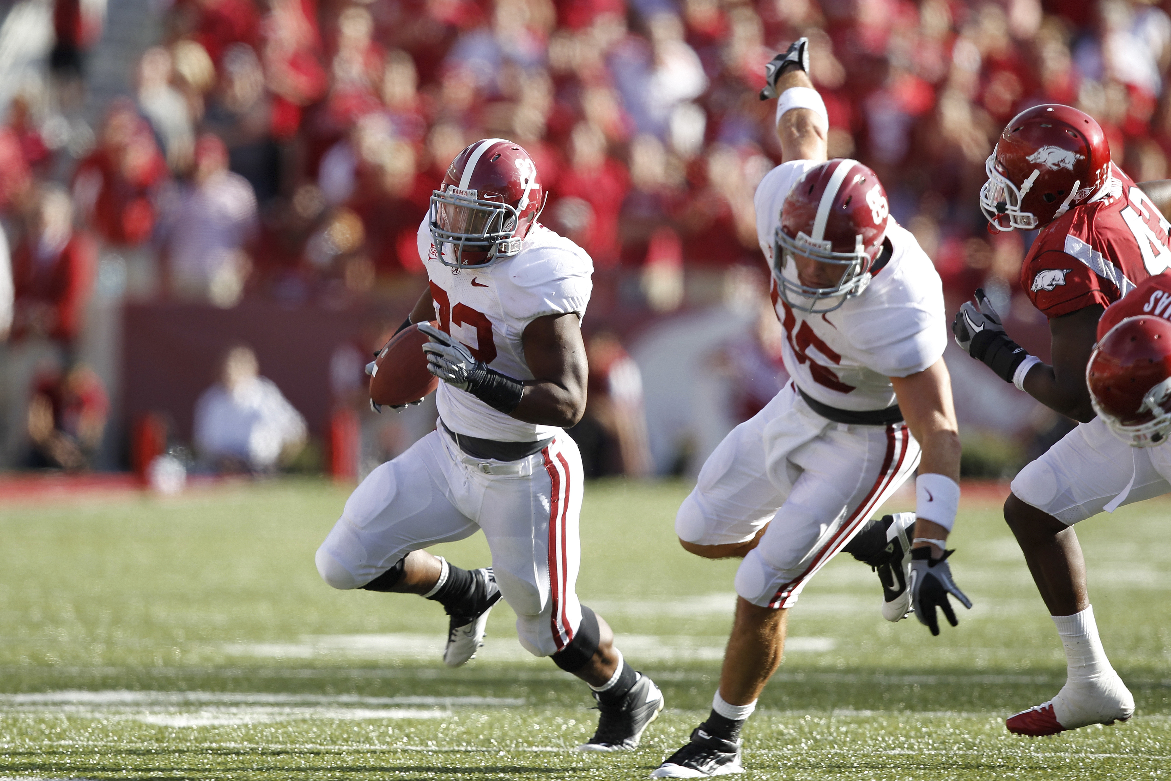 FAYETTEVILLE - SEPTEMBER 25: Mark Ingram #22 of the Alabama Crimson Tide runs the ball against the Arkansas Razorbacks at Donald W. Reynolds Razorback Stadium on September 25, 2010 in Fayetteville, Arkansas. Alabama won 24-20. (Photo by Joe Robbins/Getty