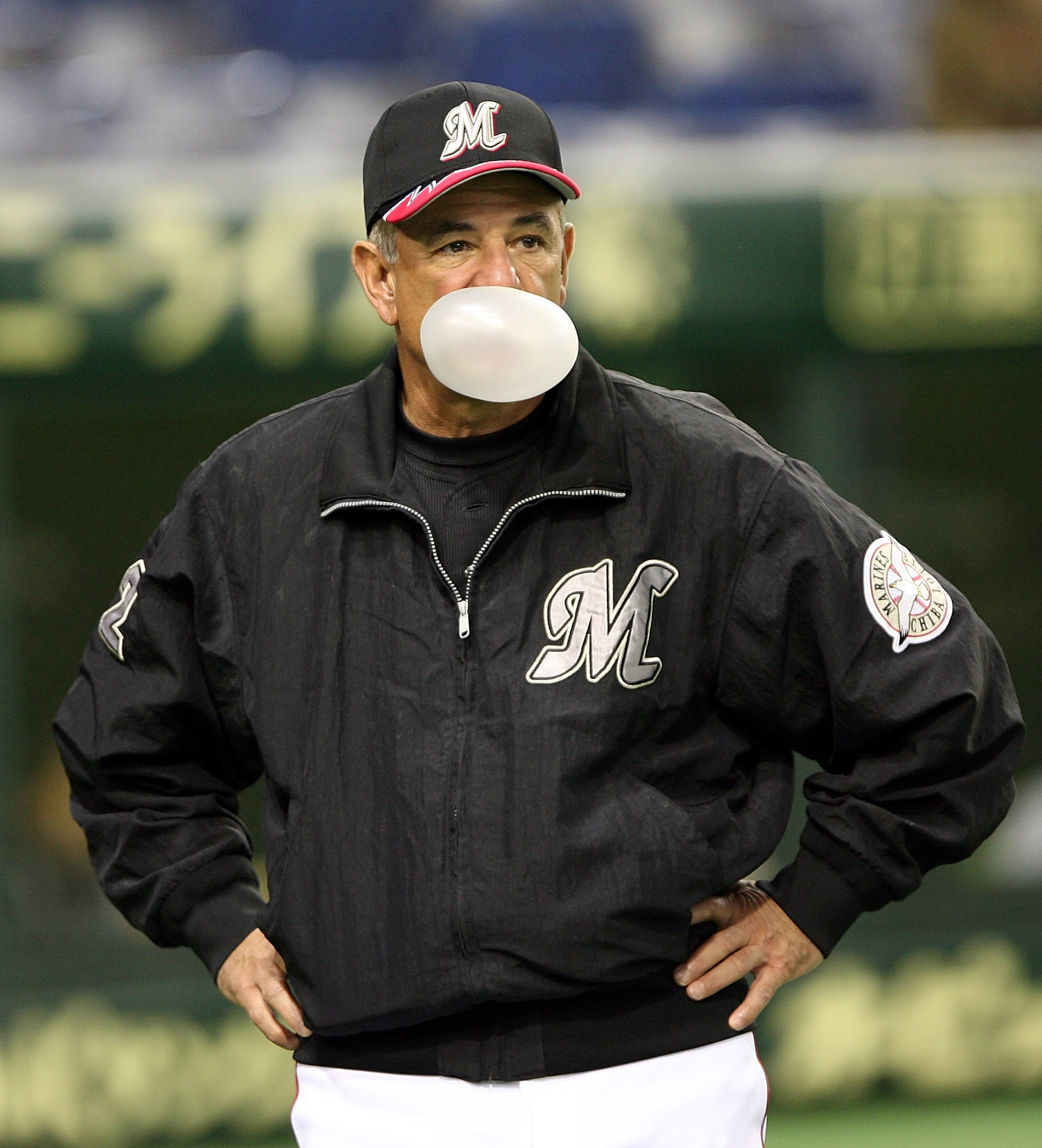 TOKYO - MARCH 1: Team Manager Bobby Valentine of the Chiba Lotte Marines blows a bubble during the 2006 World Baseball Classic Exhibition Game against Korea on March 1, 2006 at Tokyo Dome in Tokyo, Japan. The exhibition games in Tokyo take place between