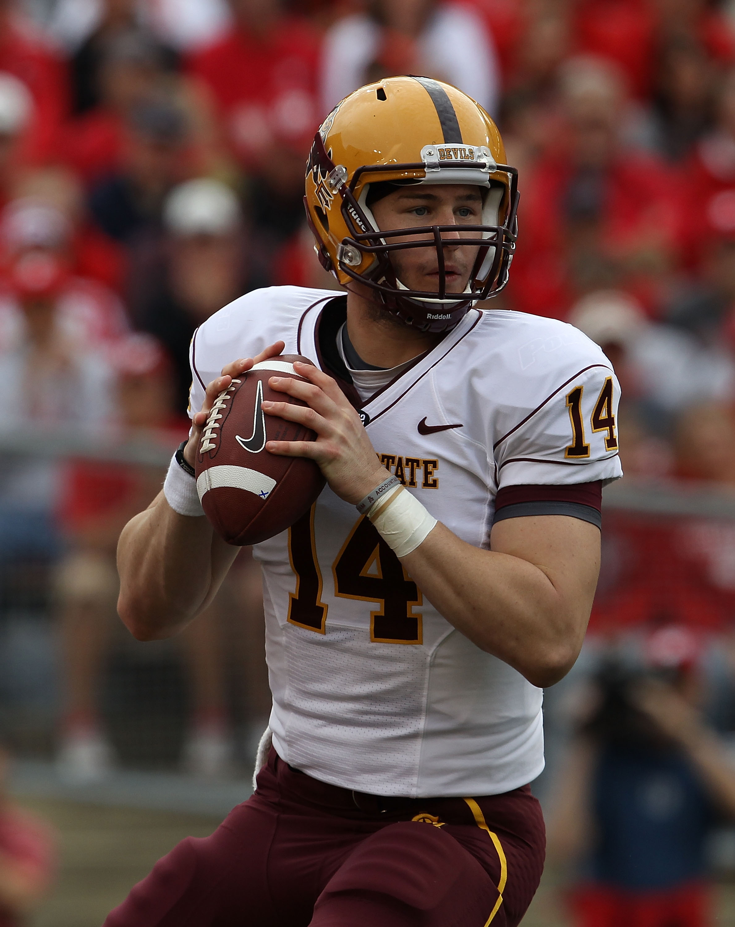 MADISON, WI - SEPTEMBER 18: Steven Threet #14 of the Arizona State Sun Devils looks for a receiver against the Wisconsin Badgers at Camp Randall Stadium on September 18, 2010 in Madison, Wisconsin. Wisconsin defeated Arizona State 20-19. (Photo by Jonath