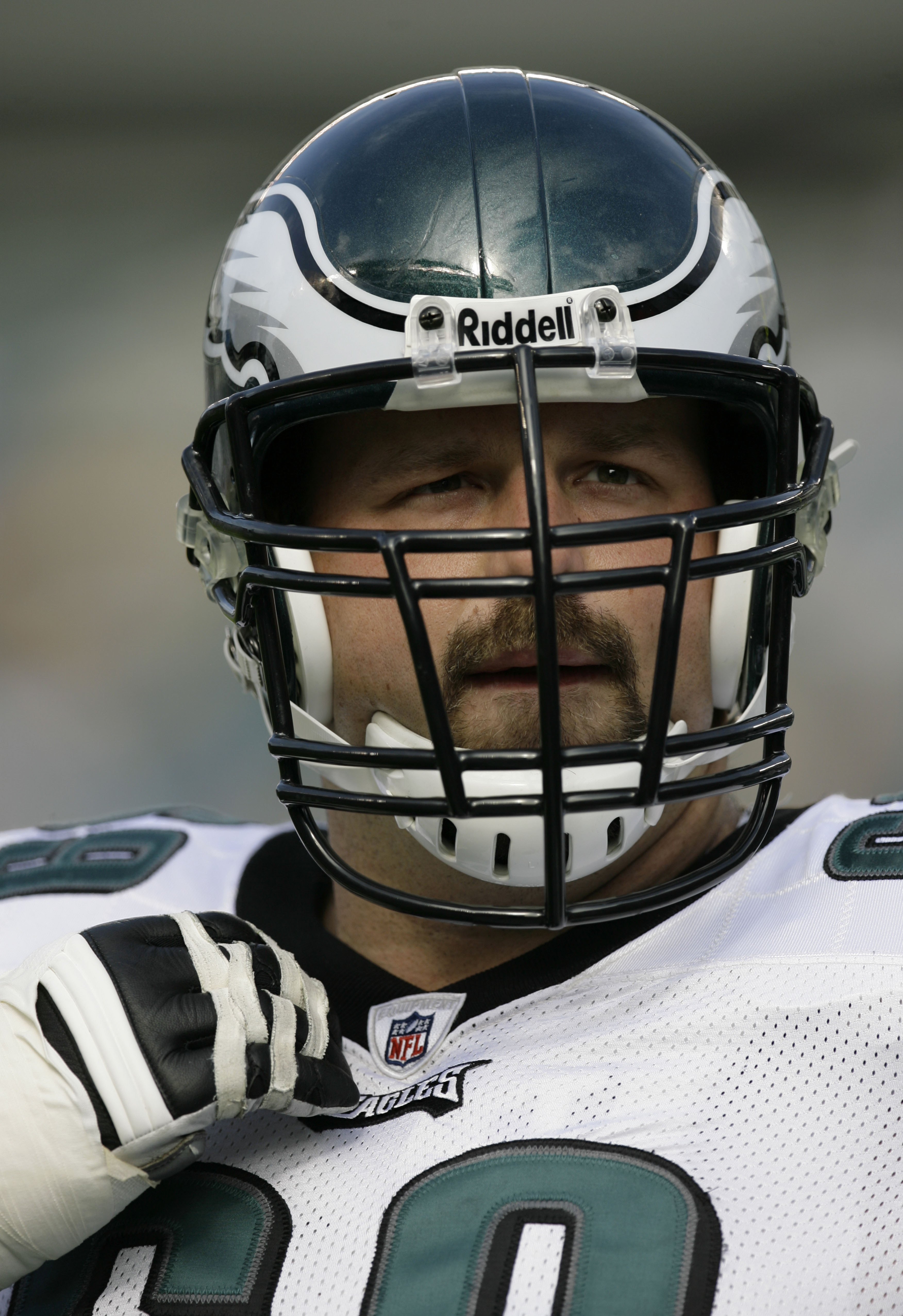 Michael Strahan in Eagles green? Jon Runyan in Giants blue? The