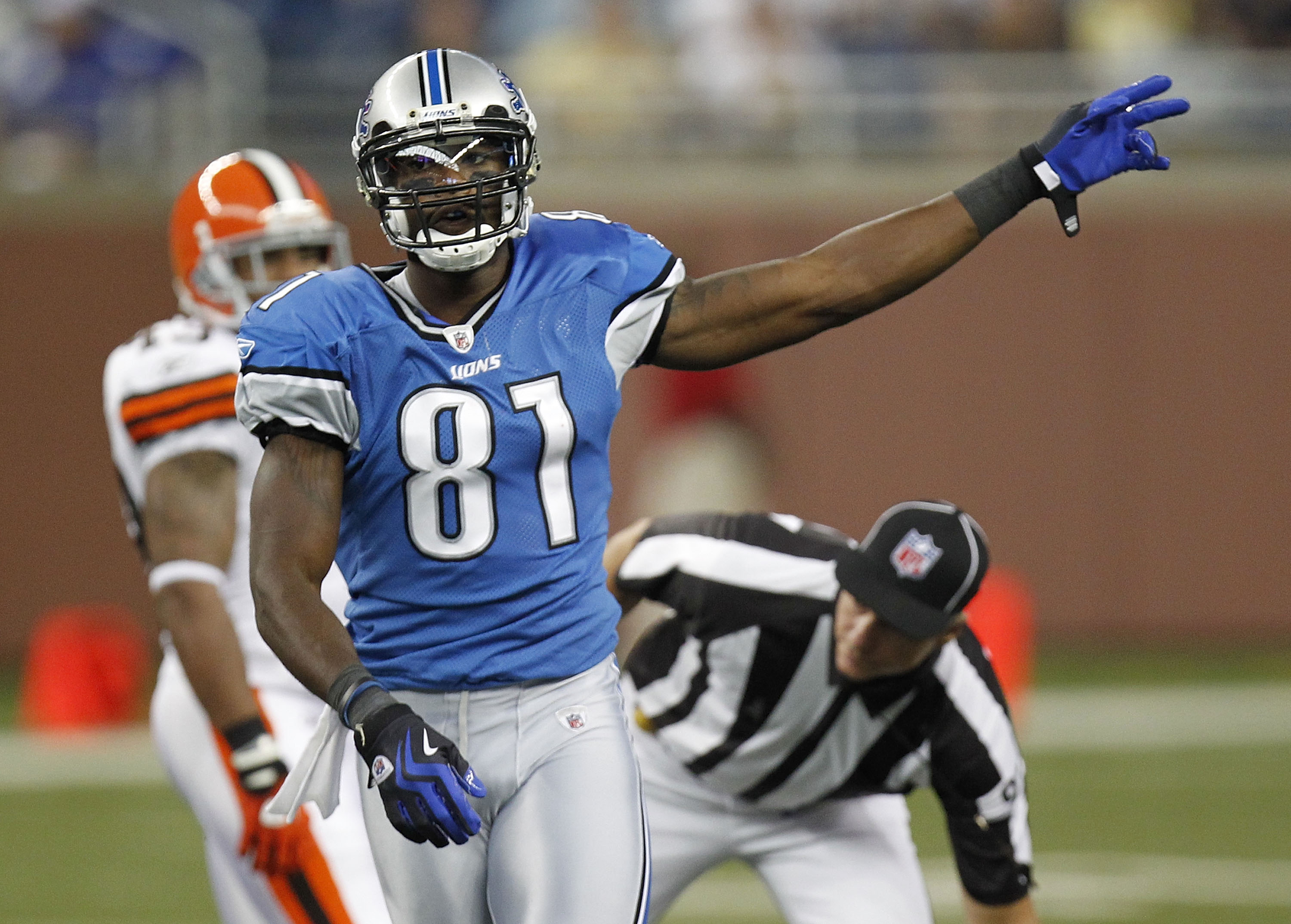 DETROIT - AUGUST 28: Calvin Johnson #81 of the Detroit Lions signals a first down after a second quarter catch during a preseason game against the Cleveland Browns on August 28, 2010 at Ford Field in Detroit, Michigan.  (Photo by Gregory Shamus/Getty Imag