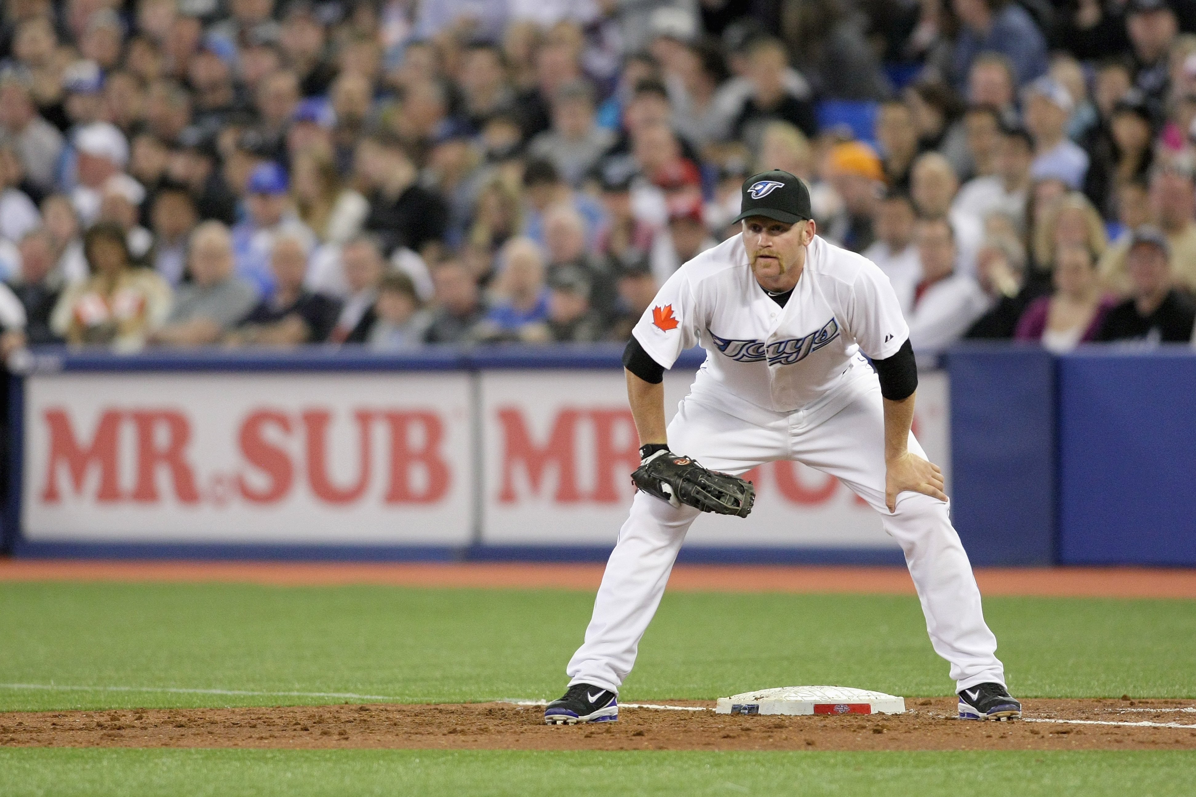 TORONTO - APRIL 12: Lyle Overbay #45 of the Toronto Blue Jays waits at first base during the game against the Chicago White Sox at the Rogers Centre on April 12, 2010 in Toronto, Ontario. (Photo By Dave Sandford/Getty Images)