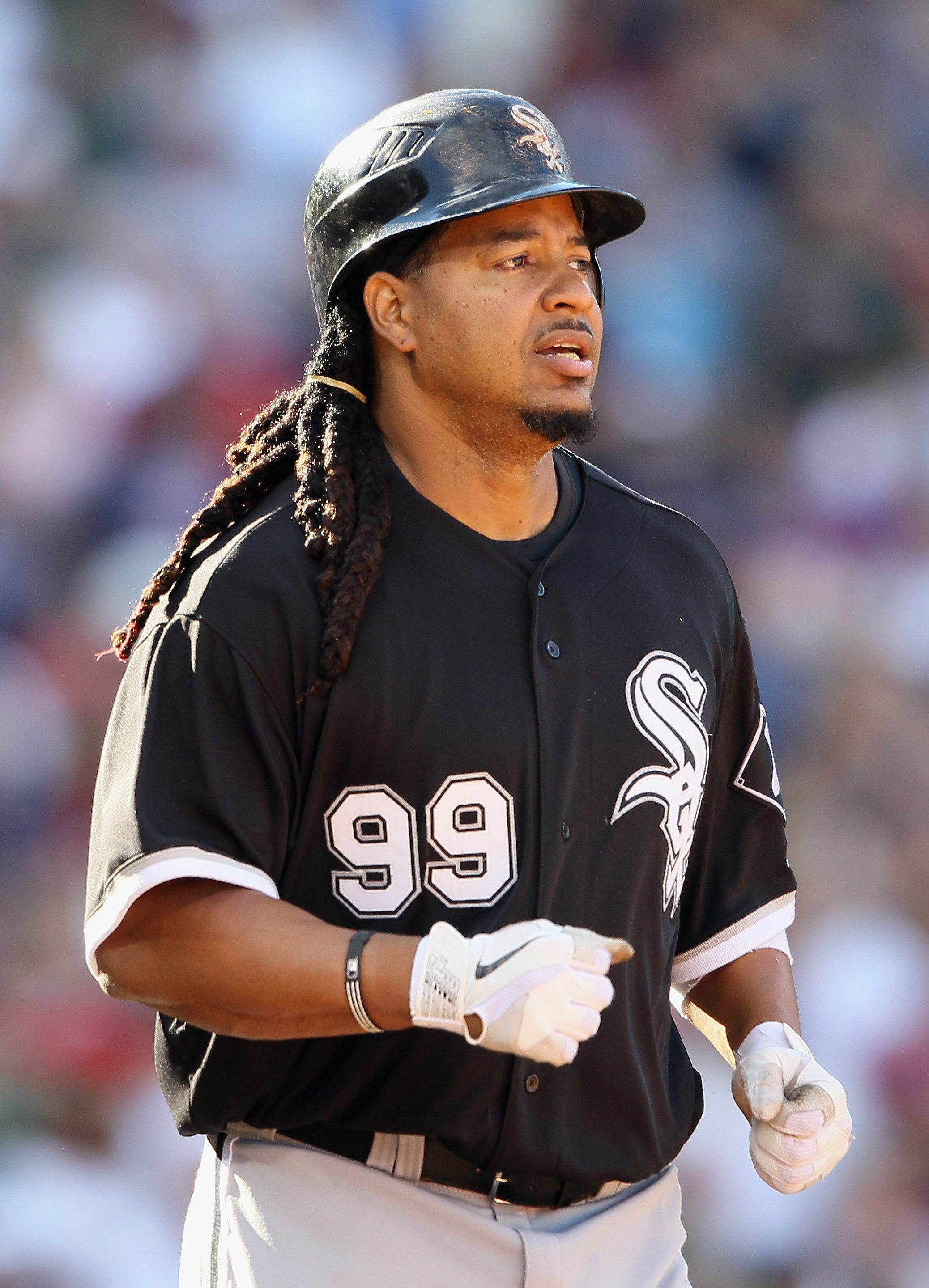 BOSTON - SEPTEMBER 05:  Manny Ramirez #99 of the Chicago White Sox heads to first base after he was hit by a pitch in the eighth inning against the Boston Red Sox on September 5, 2010 at Fenway Park in Boston, Massachusetts.  (Photo by Elsa/Getty Images)