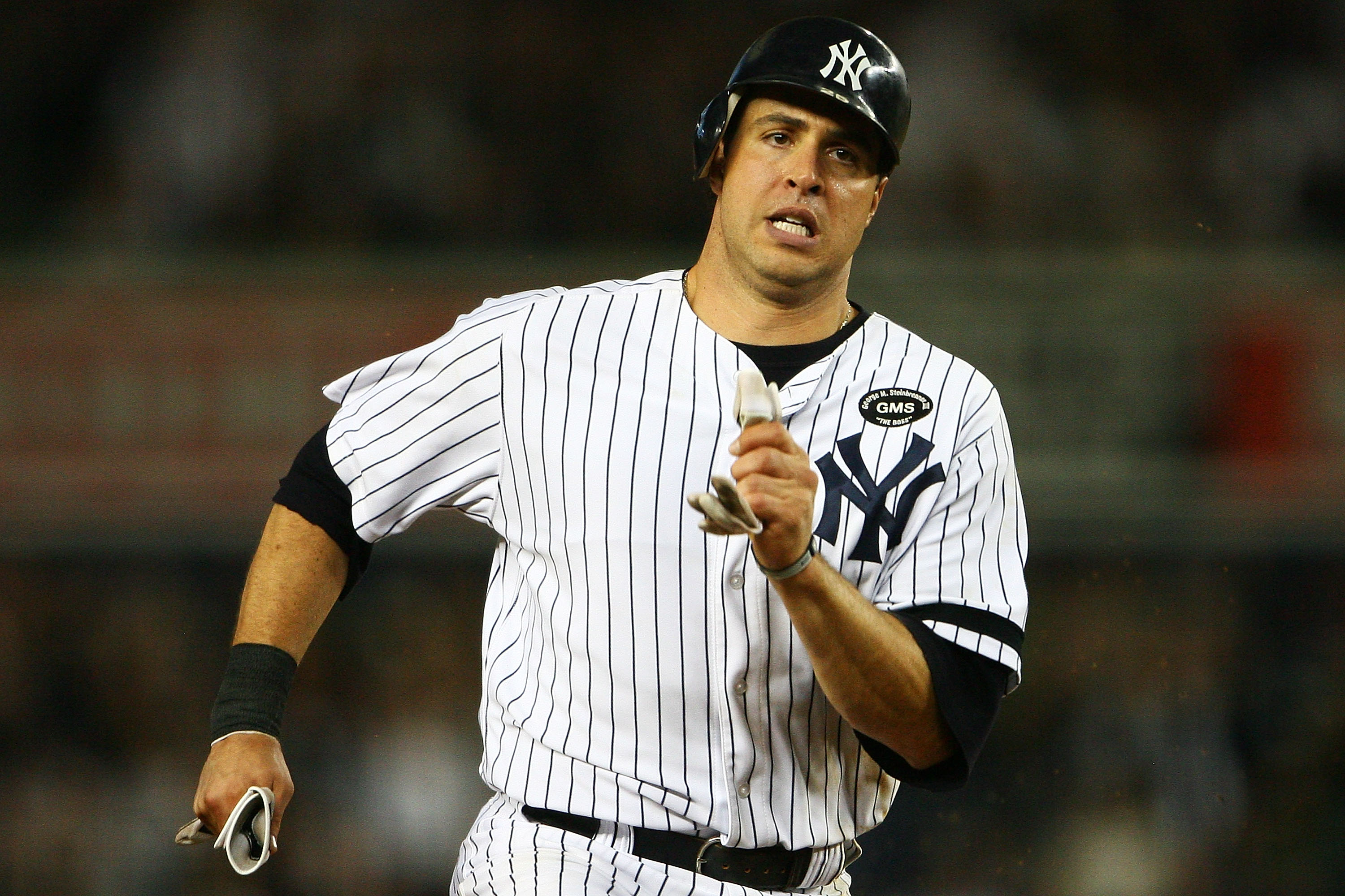 NEW YORK - SEPTEMBER 21:  Mark Teixeira #25 of the New York Yankees runs on a two run double hit by Robinson Cano in the seventh inning against the Tampa Bay Rays on September 21, 2010 at Yankee Stadium in the Bronx borough of New York City.  The Yankees