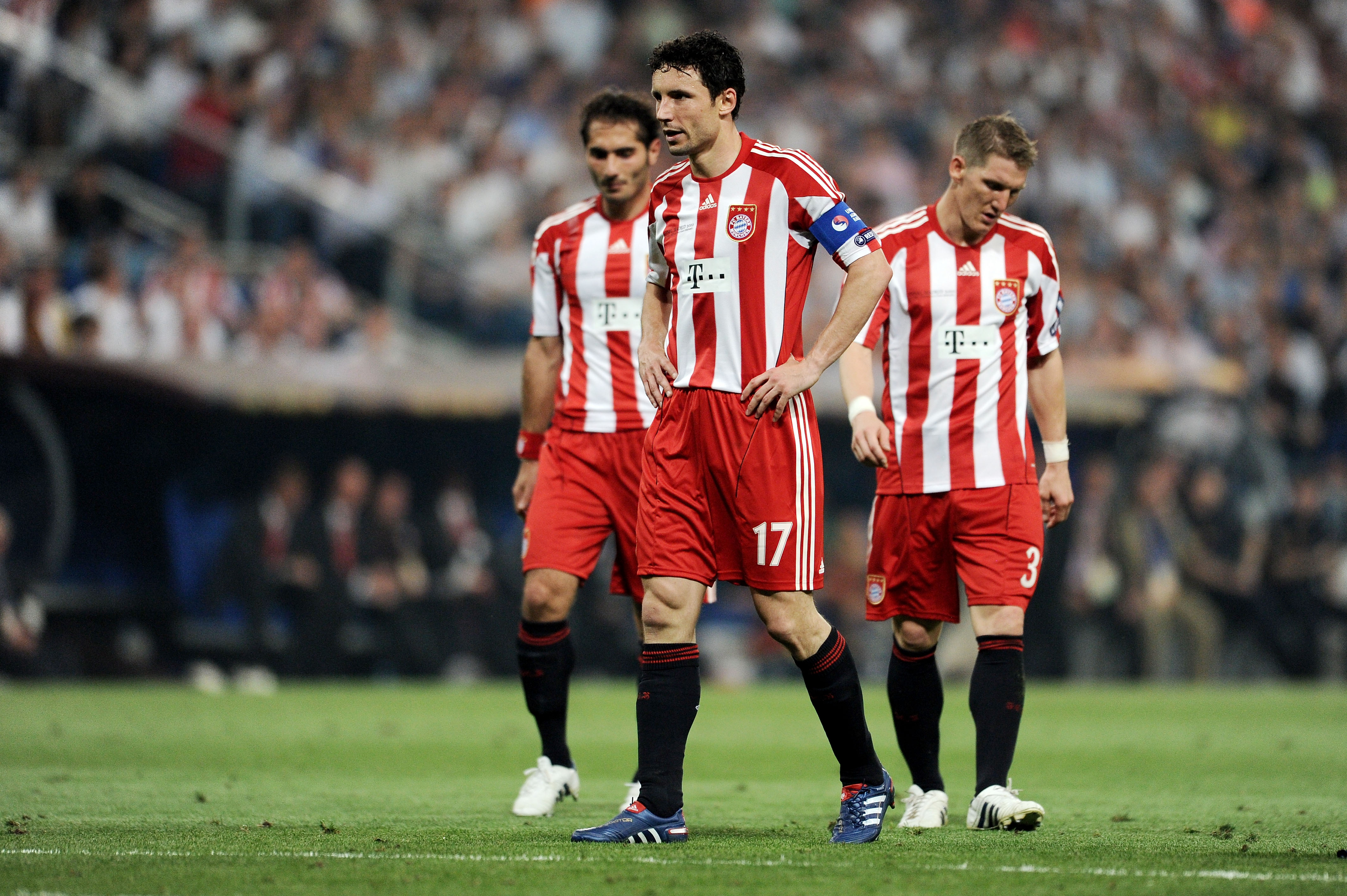 MADRID, SPAIN - MAY 22: Mark van Bommel (C), Bastian Schweinsteiger (R) and Hamit Altintop of Bayern Muenchen react during the UEFA Champions League Final match between FC Bayern Muenchen and Inter Milan at the Estadio Santiago Bernabeu on May 22, 2010 in