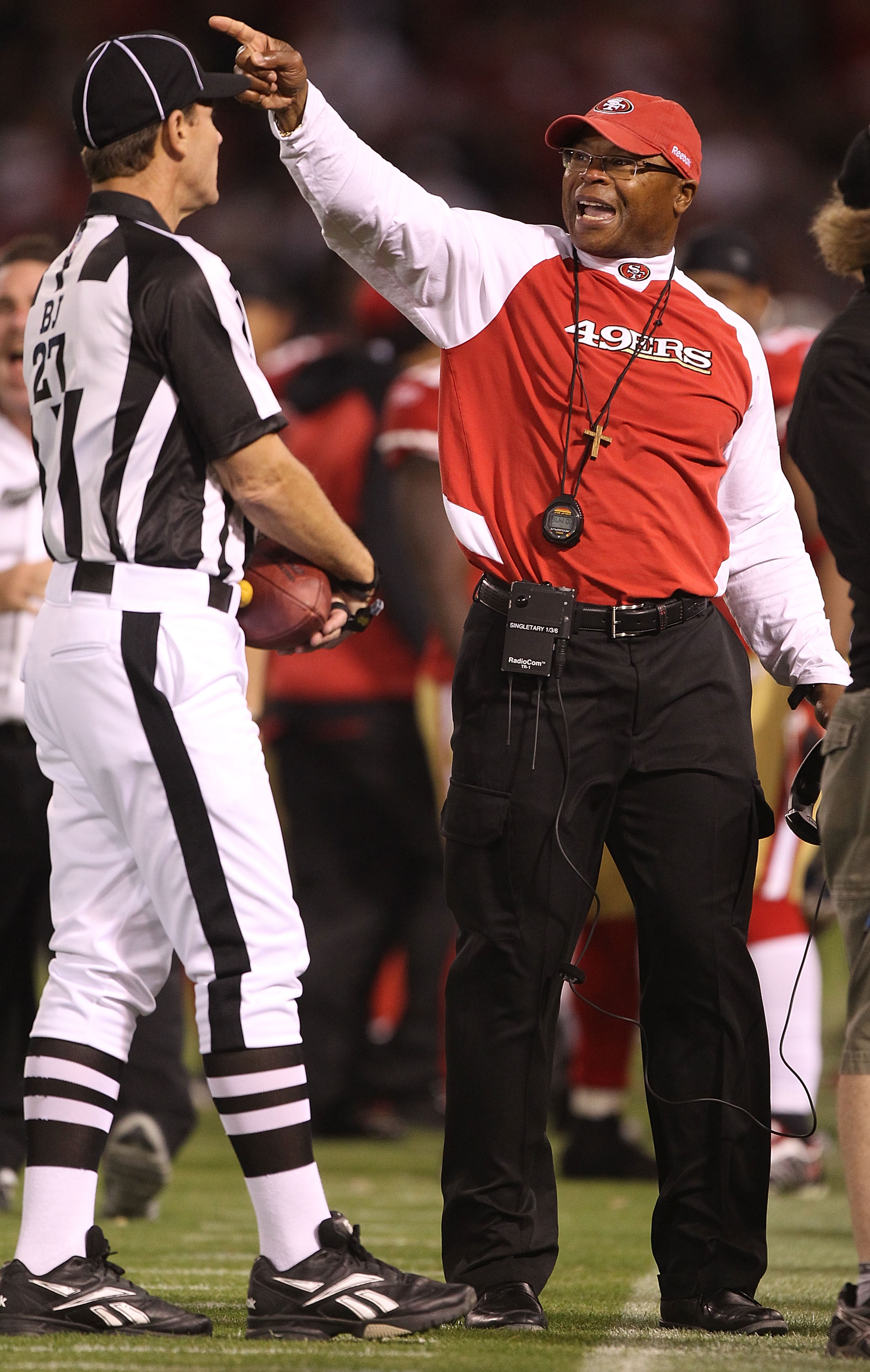 SAN FRANCISCO - SEPTEMBER 20: Head coach Mike Singletary of the San Francisco 49er talks to a referee against the New Orleans Saints during an NFL game at Candlestick Park on September 20, 2010 in San Francisco, California.(Photo by Jed Jacobsohn/Getty I
