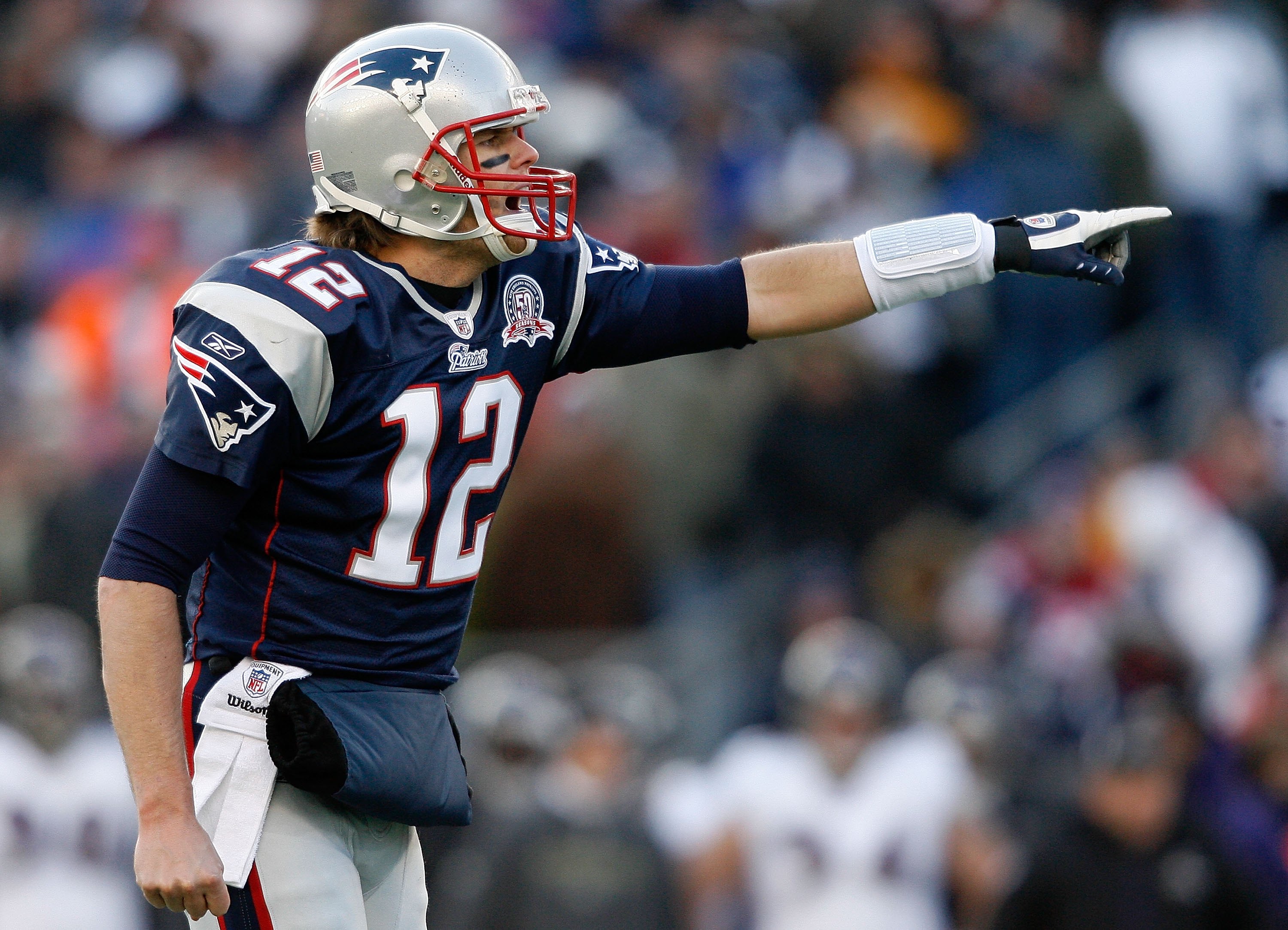 New England Patriots wide receiver Wes Welker (83) runs with the football  during of an NFL football game against the Miami Dolphins Monday Oct. 4,  2010 in Miami. (AP Photo Stock Photo - Alamy