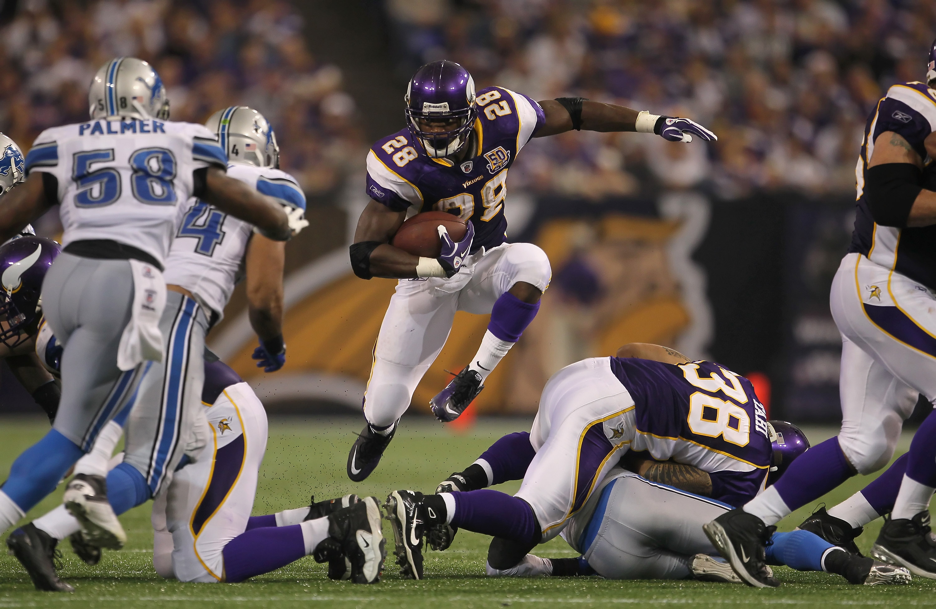 Vikings' Adrian Peterson finishes season as NFL's top rusher with 1,760  yards (and nine fumbles) – Twin Cities