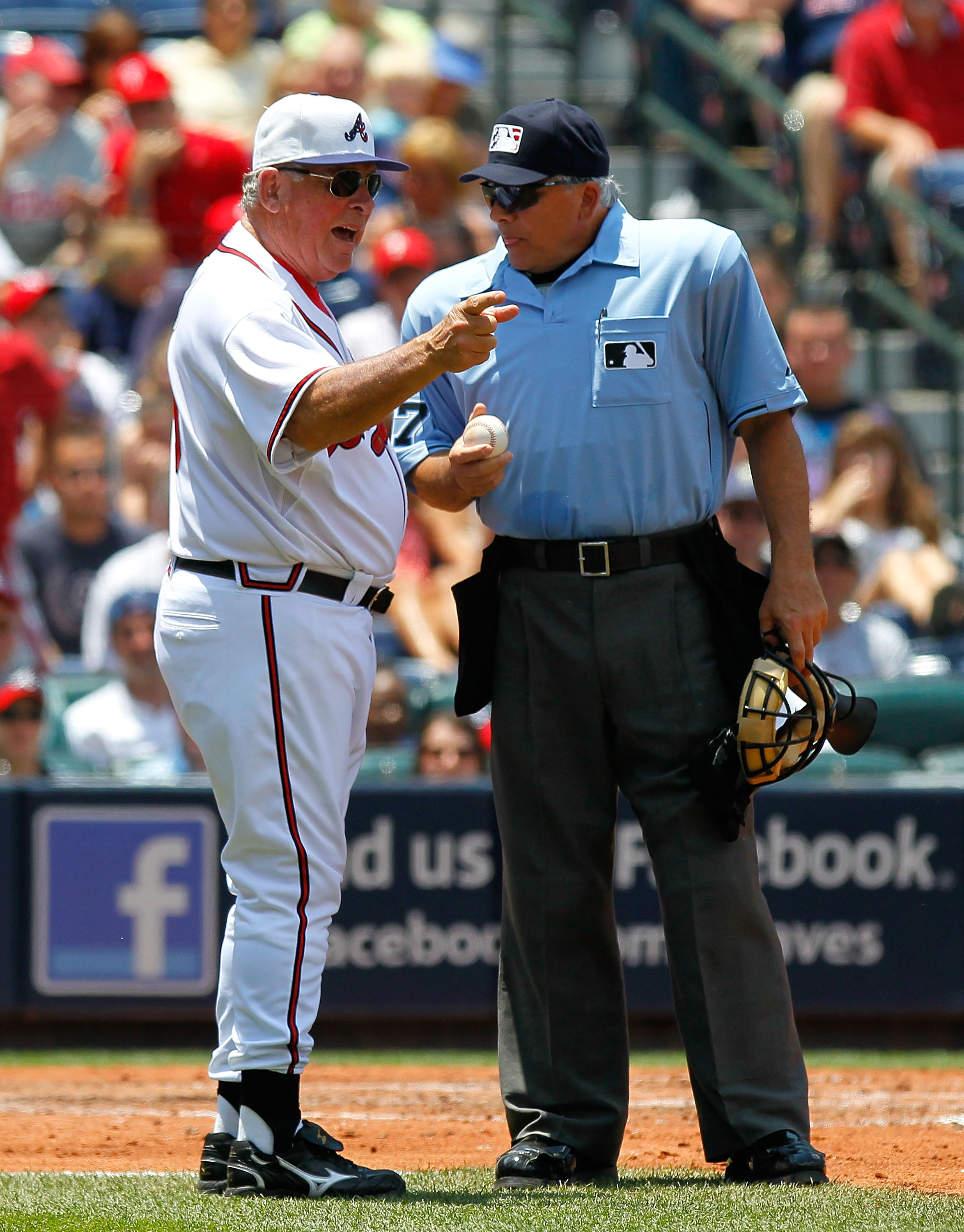 ATLANTA - MAY 31: Manager Bobby Cox #6 of the Atlanta Braves argues a call with homeplate umpire Larry Vanover #27 in the third inning against the Philadelphia Phillies at Turner Field on May 31, 2010 in Atlanta, Georgia. (Photo by Kevin C. Cox/Getty Im