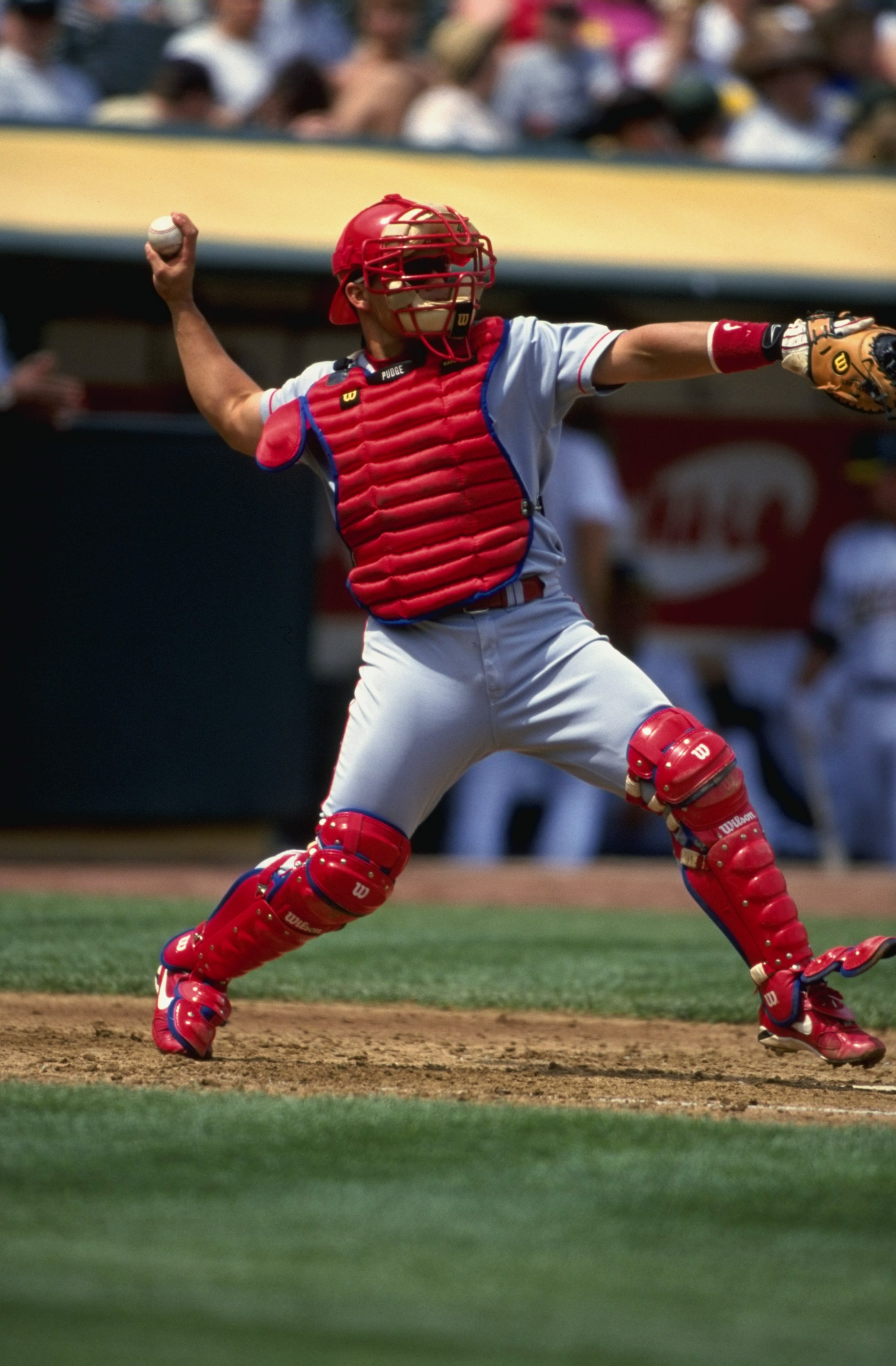 18 Apr 1999:  Catcher Ivan Rodriguez #7 of the Texas Rangers  throws the ball during the game against the Oakland Athletics at the Oakland Coliseum in Oakland, California. The Rangers defeated the Athletics 6-2. Mandatory Credit: Jed Jacobsohn  /Allsport