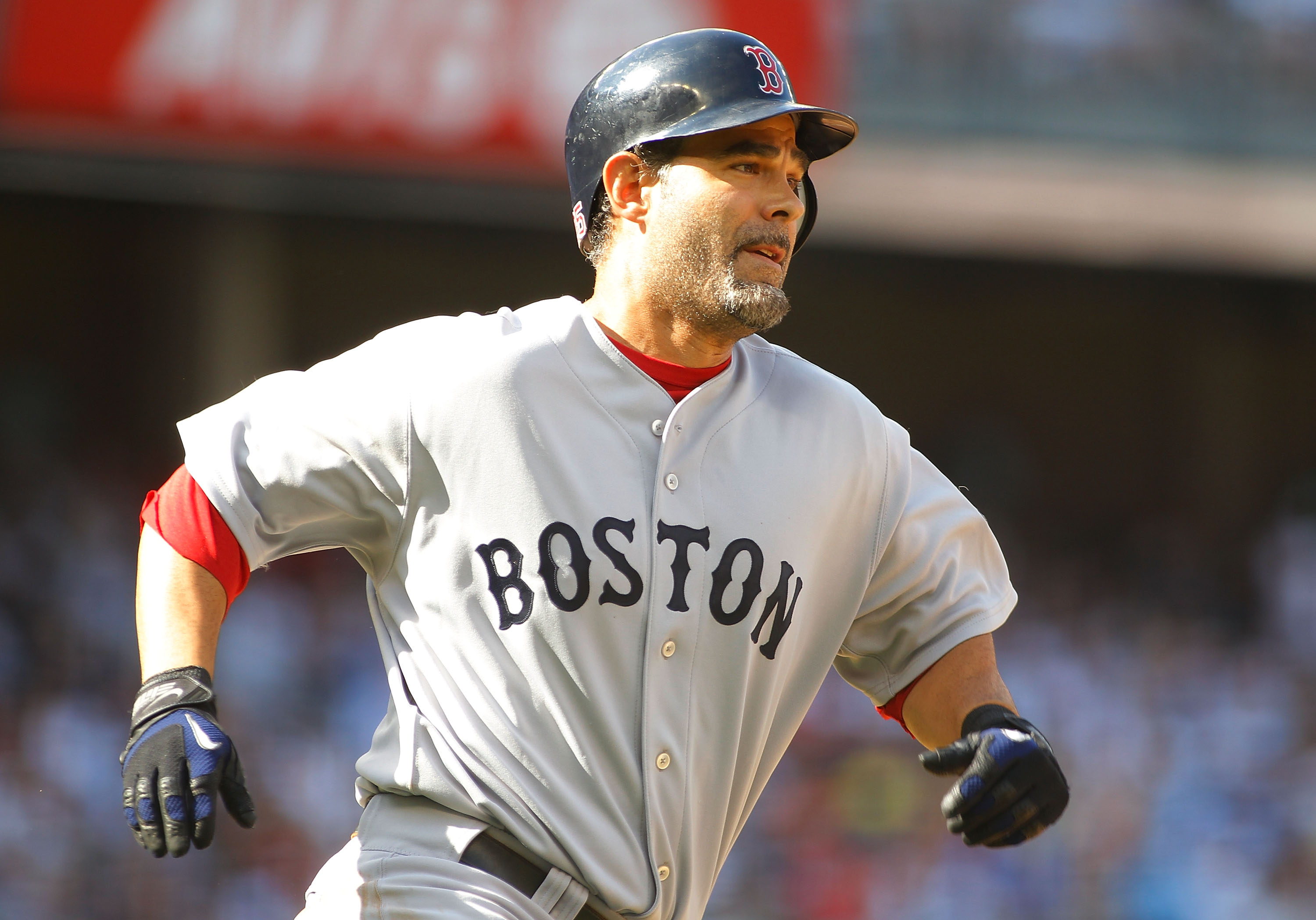 NEW YORK - AUGUST 07:  Mike Lowell #25 of the Boston Red Sox hits an RBI double in the second-inning against the New York Yankees on August 7, 2010 at Yankee Stadium in the Bronx borough of New York City.  (Photo by Mike Stobe/Getty Images)