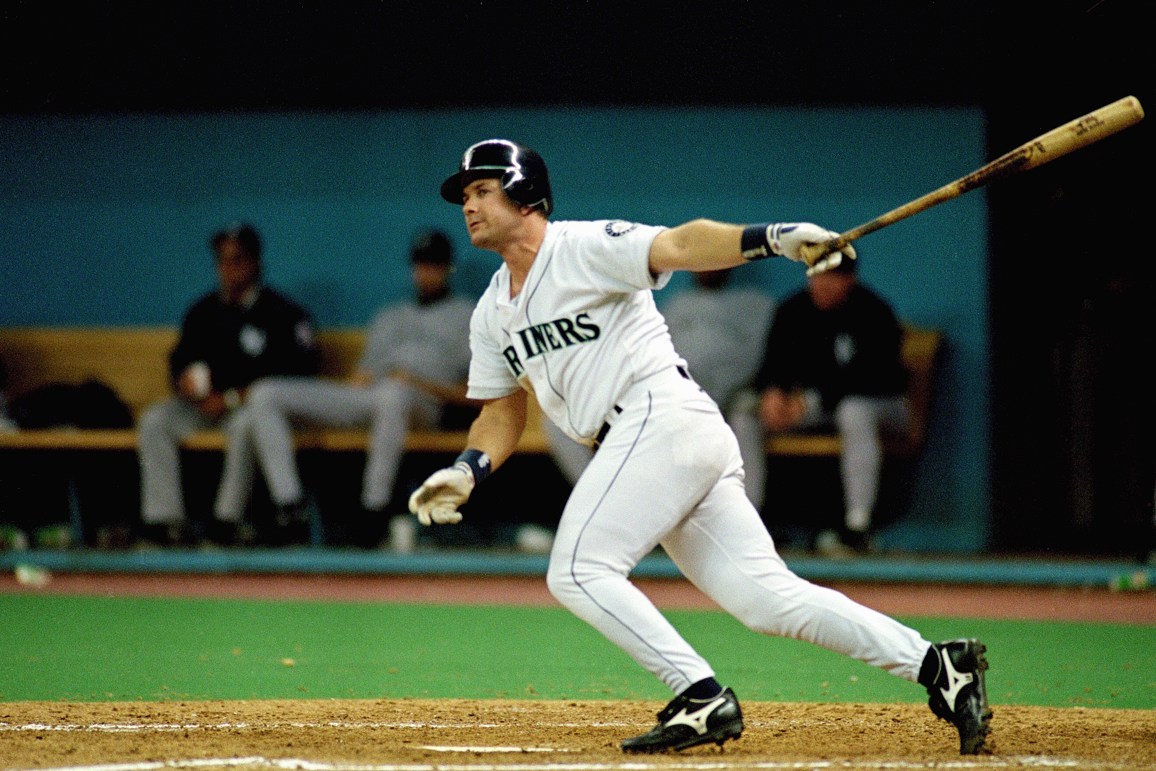 SEATTLE - OCTOBER 8:  Edgar Martinez #11 of the Seattle Mariners doubles home the game winning runs in Game five of the 1995 American League Divisional Series against the New York Yankees at the Kingdome on October 8, 1995 in Seattle, Washington. The Mari