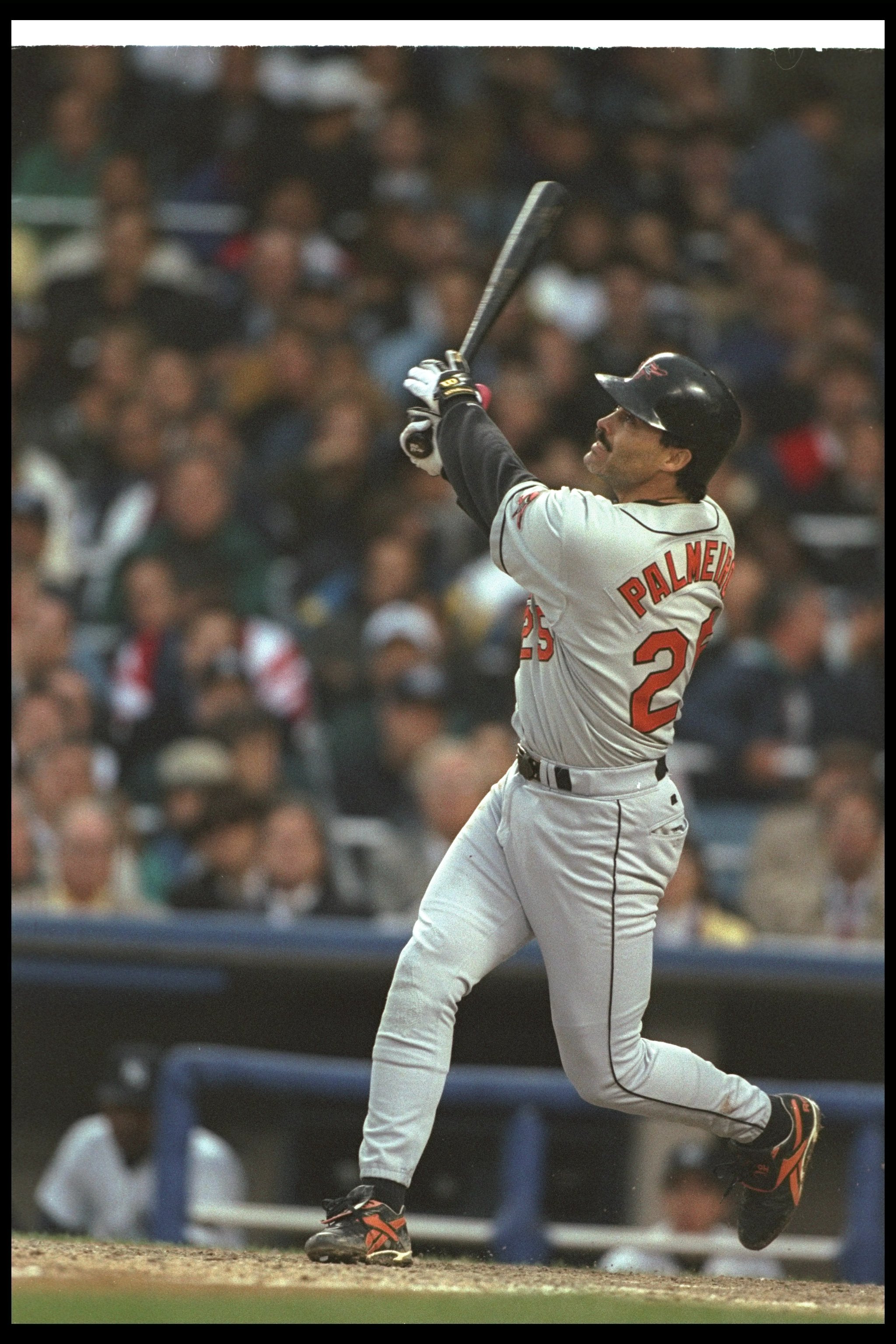 10 Oct 1996:  First baseman Rafael Palmeiro of the Baltimore Orioles hits the ball during a championship game against the New York Yankees at Yankee Stadium in New York City, New York.  The Orioles won the game, 5-3. Mandatory Credit: Simon Bruty  /Allspo