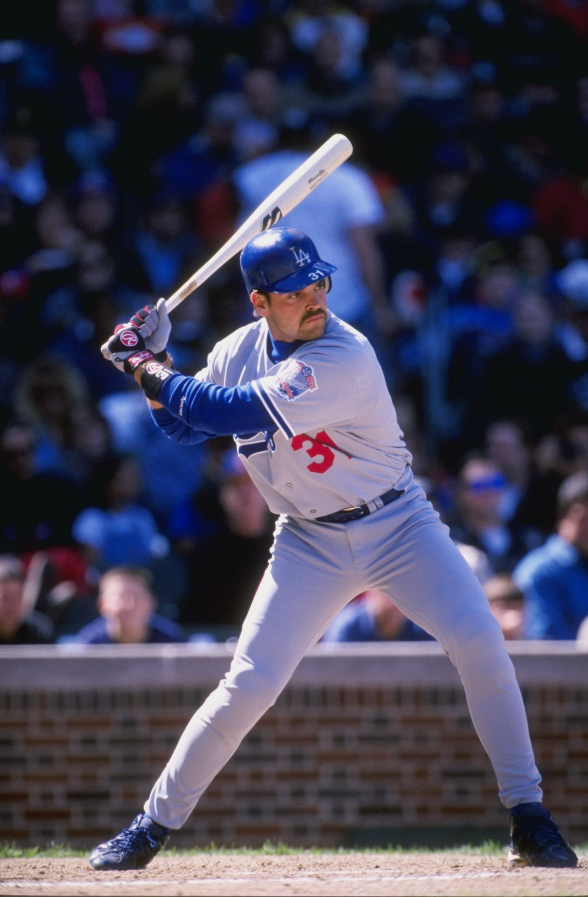 17 Apr 1998:  Catcher Mike Piazza of the Los Angeles Dodgers in action during a game against the Chicago Cubs at Wrigley Field in Chicago, Illinois. The Dodgers defeated the Cubs 10-3. Mandatory Credit: Harry How  /Allsport