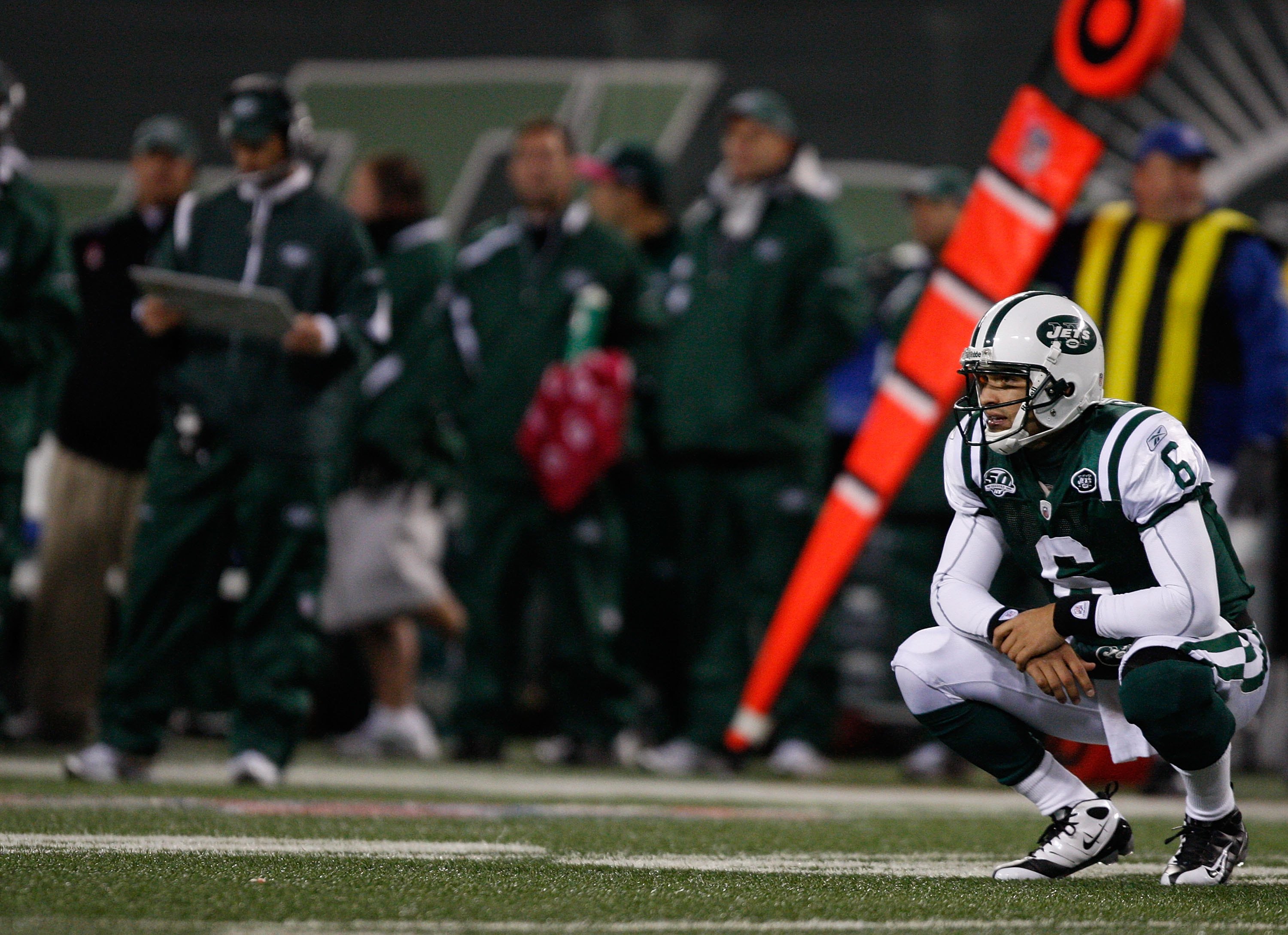 EAST RUTHERFORD, NJ - OCTOBER 18: Mark Sanchez #6 of the New York Jets crouches to the ground after throwing an interception against the Buffalo Bills during the game on October 18, 2009 at Giants Stadium in East Rutherford, New Jersey. The Bills defeated