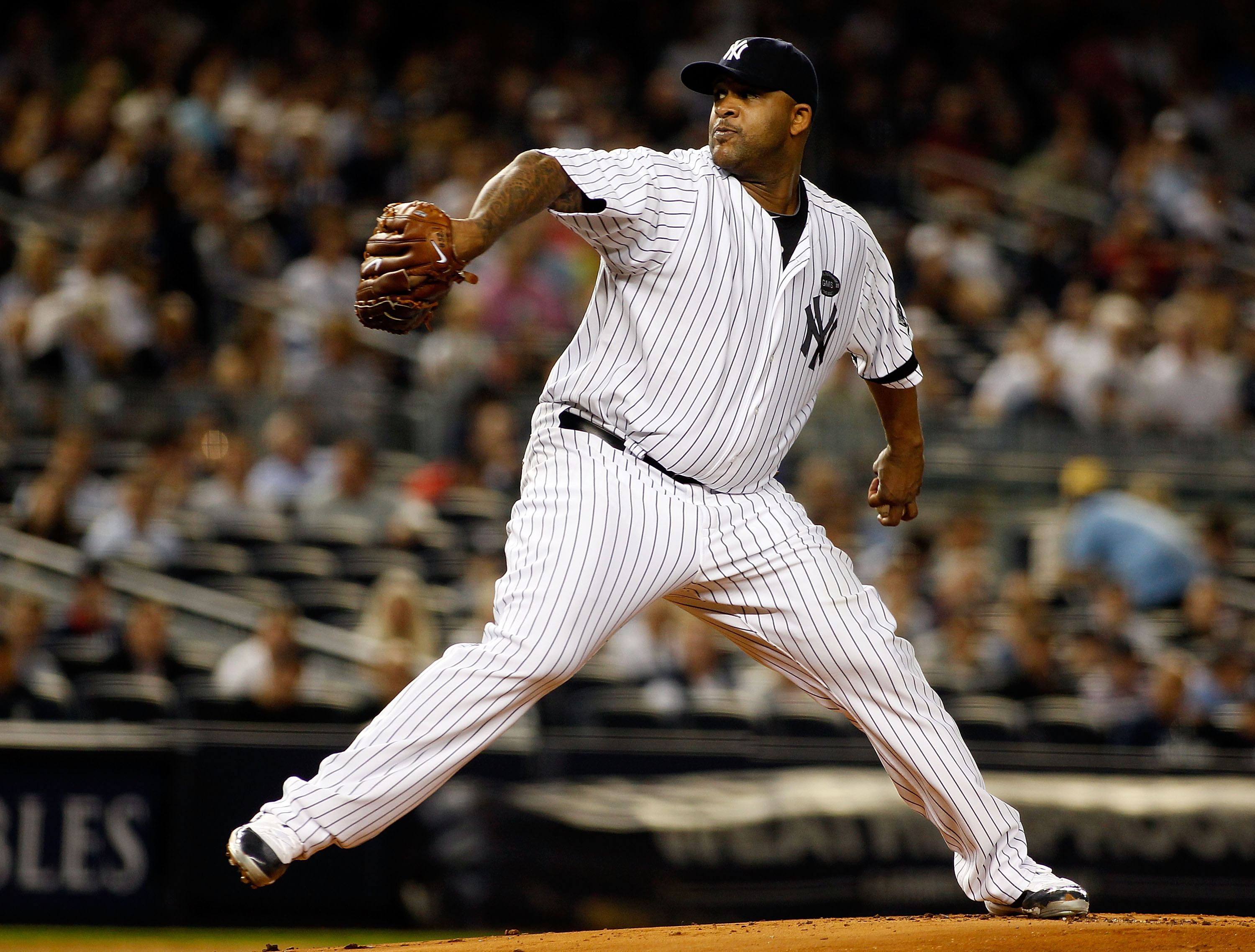 New York Yankees starting pitcher CC Sabathia delivers a pitch to the  News Photo - Getty Images