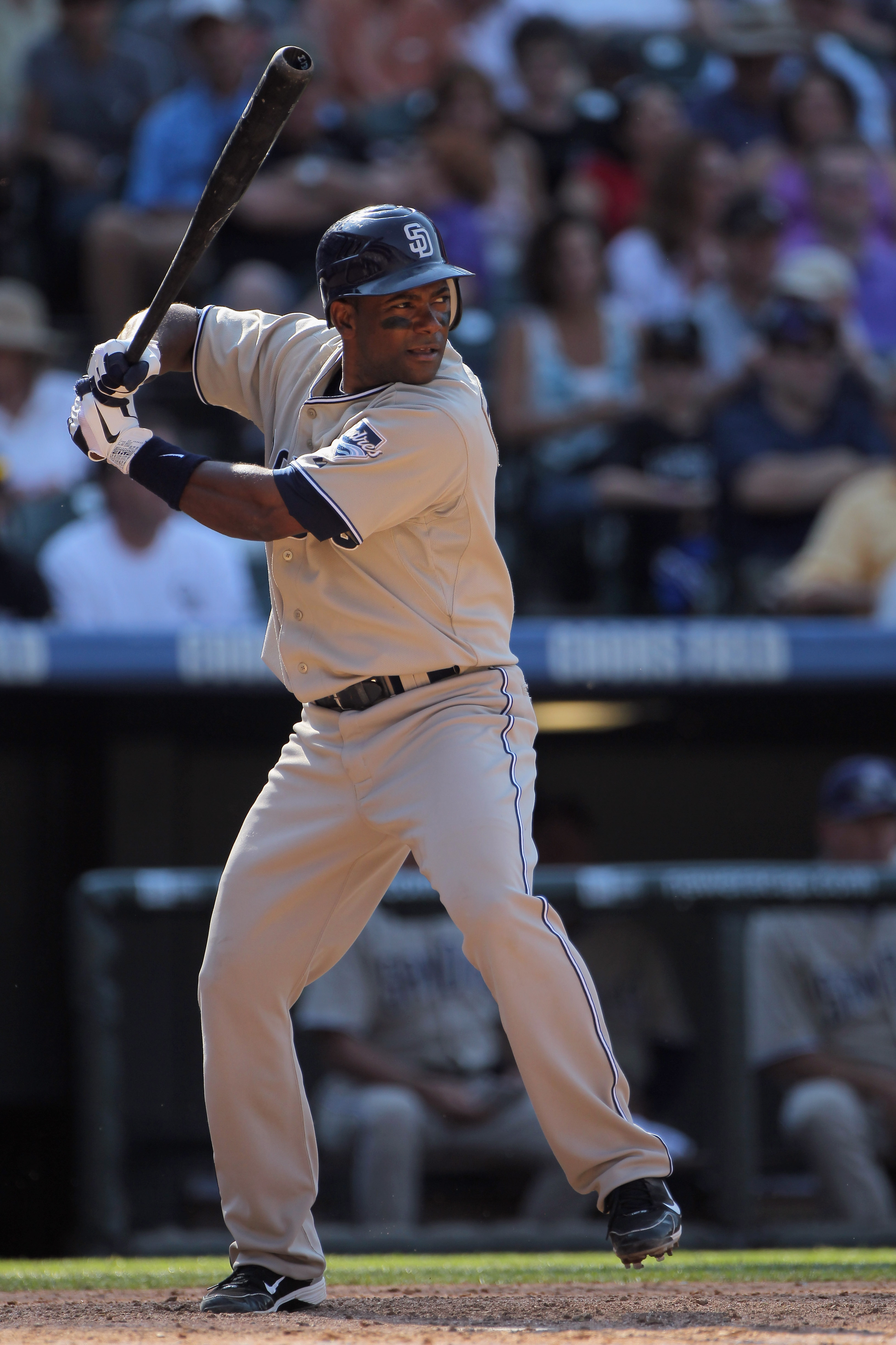 DENVER - SEPTEMBER 15:  Miguel Tejada #10 of the San Diego Padres takes an at bat against the Colorado Rockies at Coors Field on September 15, 2010 in Denver, Colorado. The Rockies defeated the Padres 9-6.  (Photo by Doug Pensinger/Getty Images)