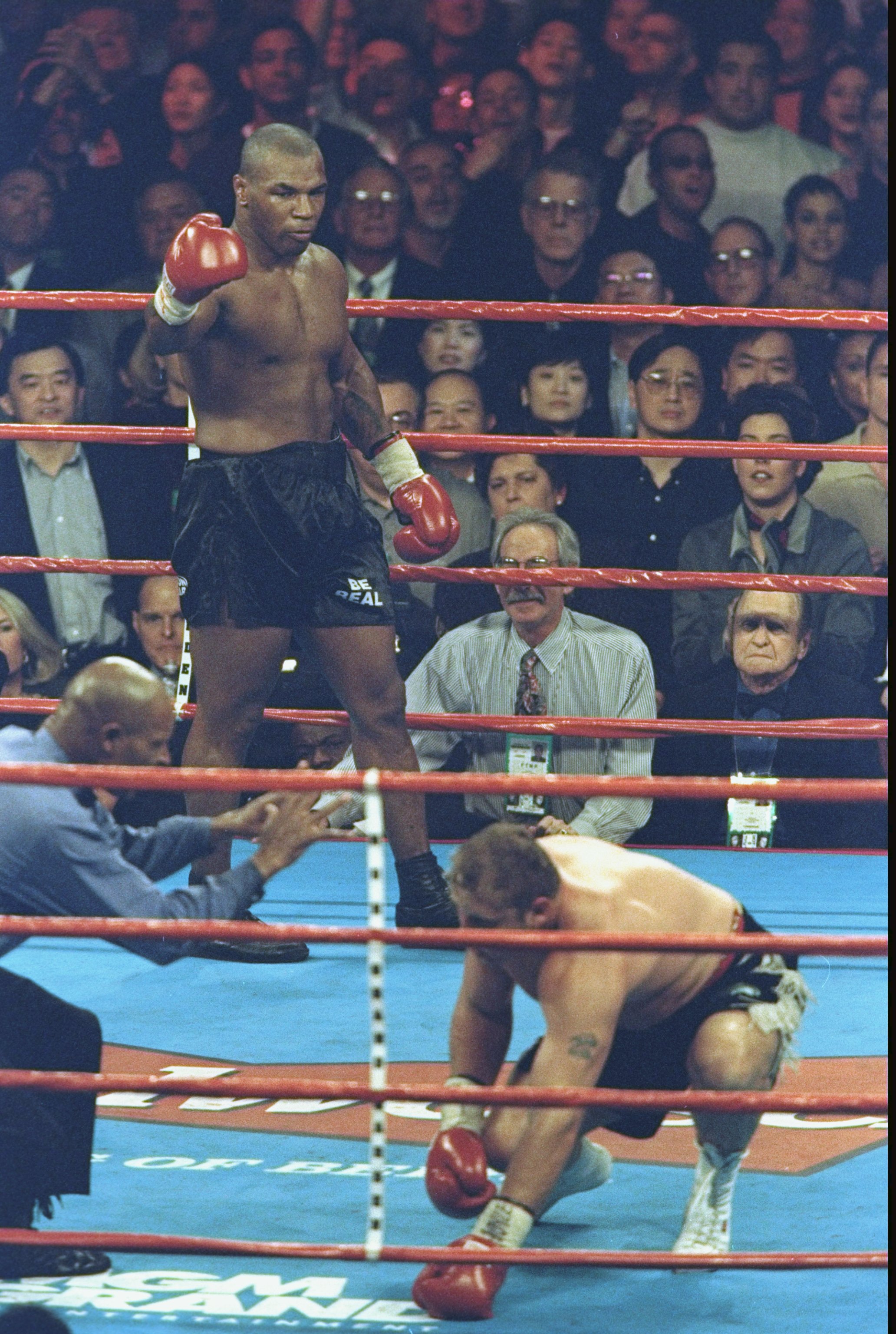 16 Jan 1999: Referee Richard Steele counts out Francois Botha in the fifth round during his first fight against Mike Tyson at the MGM Grand Garden Arena in Las Vegas, Nevada. Tyson defeated Botha by a counted out in the fifth round by the referee.