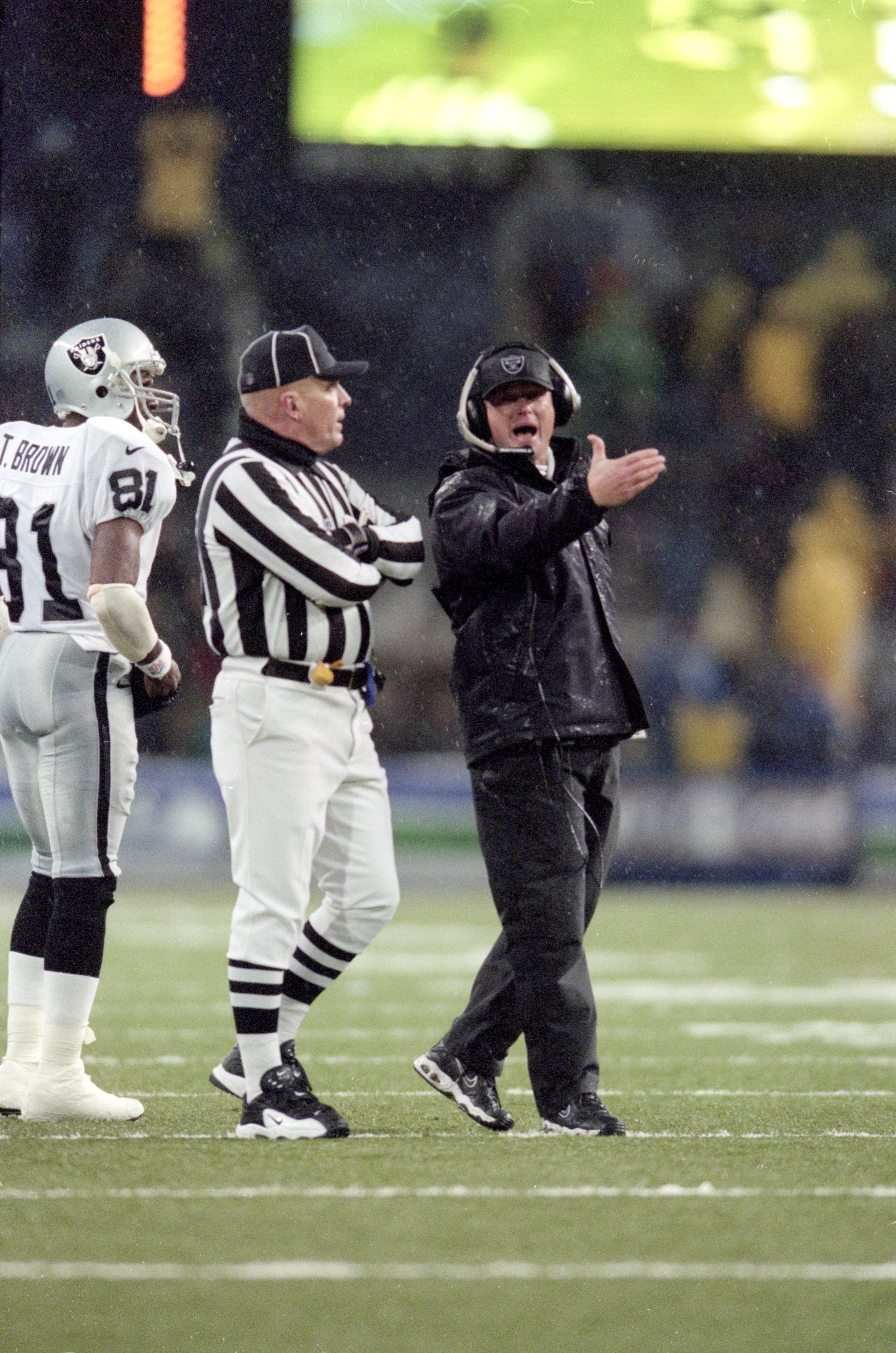 Oakland, California, USA. 26th Sep, 2004. Raider fan holds up Chucky doll  head to intimidate Buccaneers head coach Jon Gruden on Sunday, September  26, 2004, in Oakland, California. The Raiders defeated the