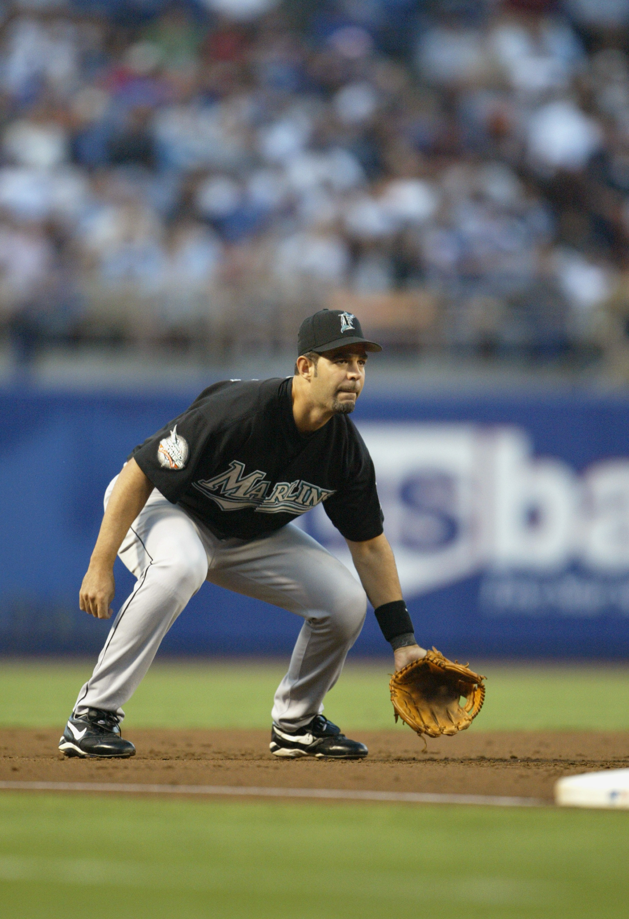 LOS ANGELES - AUGUST 17:  Infielder Mike Lowell #19 of the Florida Marlins plays defense against the Los Angeles Dodgers during the game at Dodger Stadium on August 17, 2004 in Los Angeles, California. The Dodgers won 6-1. (Photo by Jeff Gross/Getty Image