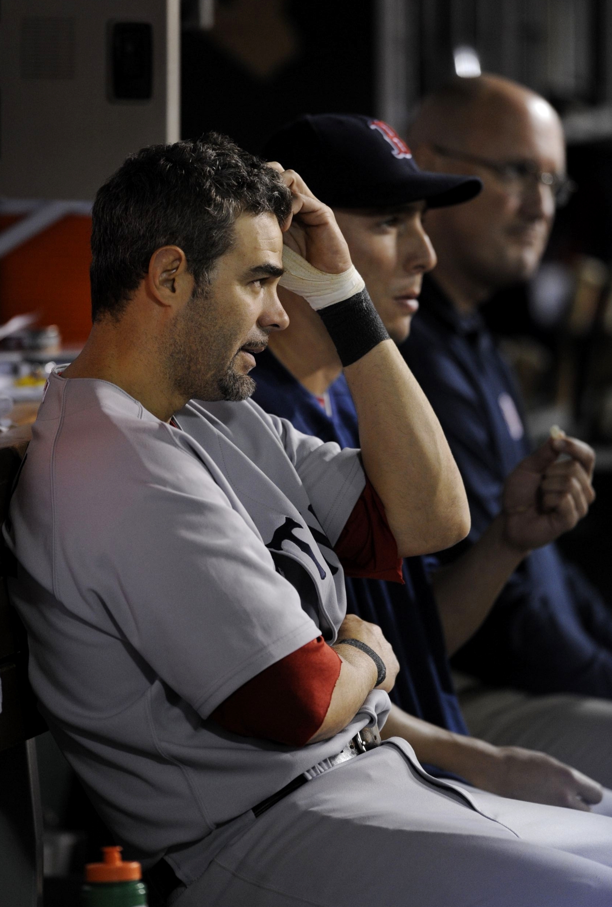 ANAHEIM, CA - OCTOBER 09:  Mike Lowell #25 of the Boston Red Sox watches the game from the dugout during the ALDS in the 2009 MLB Playoffs against the Los Angeles Angels of Anaheim at Angel Stadium on October 9, 2009 in Anaheim, California. (Photo by Kevo