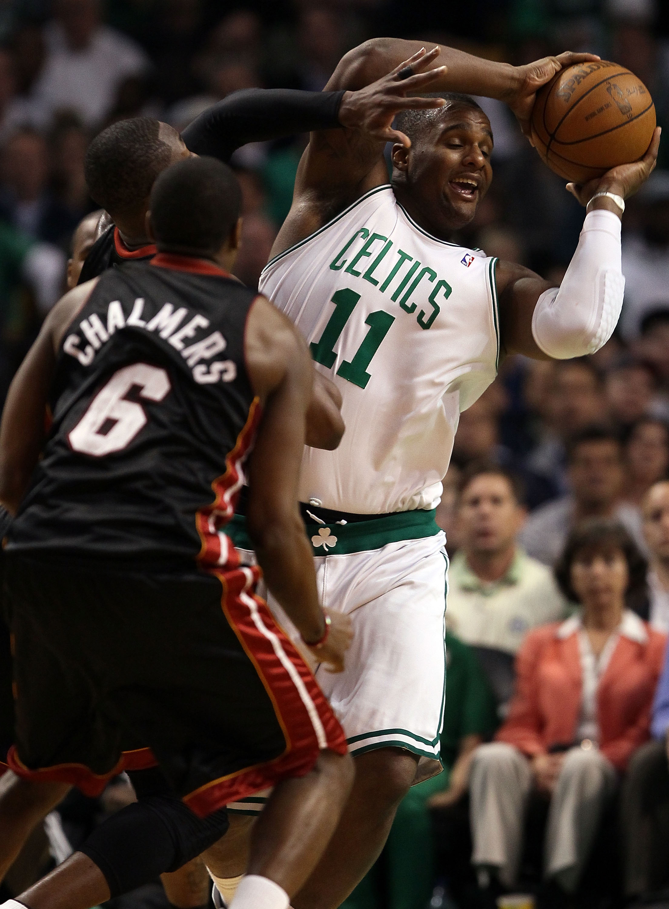 BOSTON - APRIL 27:  Glen Davis #11 of the Boston Celtics triest to keep the ball from Dwyane Wade #3 and Mario Chalmers #6 of the Miami Heat during Game Five of the Eastern Conference Quarterfinals of the 2010 NBA playoffs at the TD Garden on April 27, 20