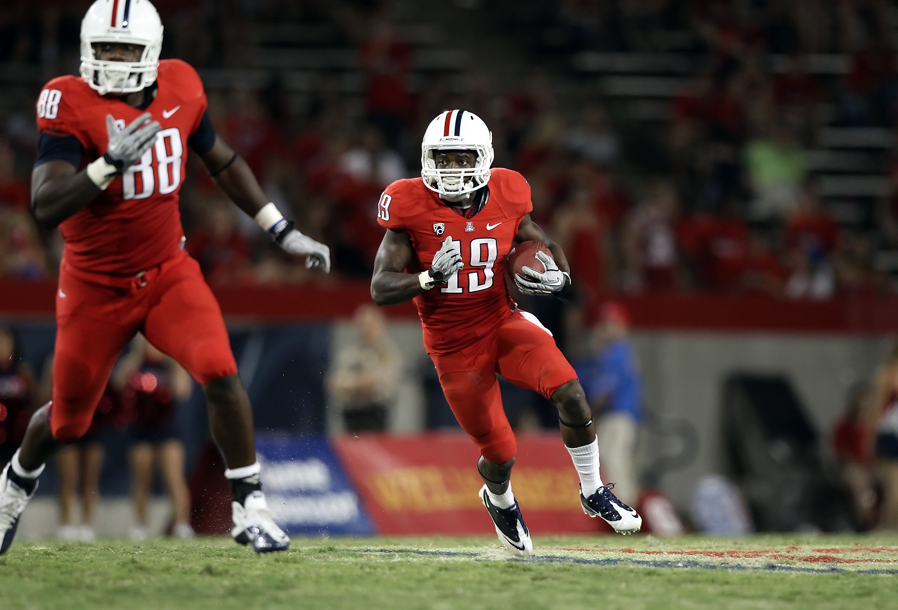 TUCSON, AZ - SEPTEMBER 25: Wide receiver William Wright #19 of the Arizona Wildcats runs with the football during the college football game against the California Golden Bears at Arizona Stadium on September 25, 2010 in Tucson, Arizona. The Wildcats de