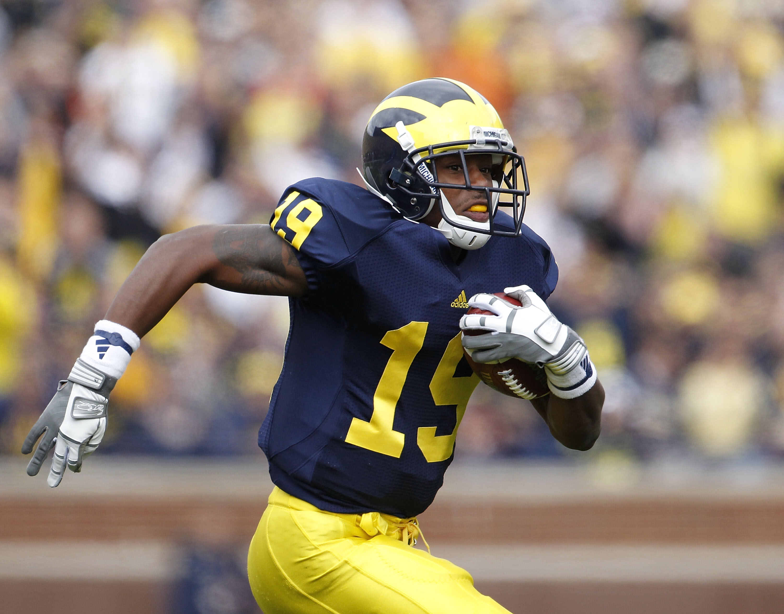 ANN ARBOR, MI - SEPTEMBER 25: Kelvin Grady #19 of the Michigan Wolverines runs for a 19 yard gain during the second quarter of the game against Bowling Green on September 25, 2010 at Michigan Stadium in Ann Arbor, Michigan. Michigan defeated Bowling Green