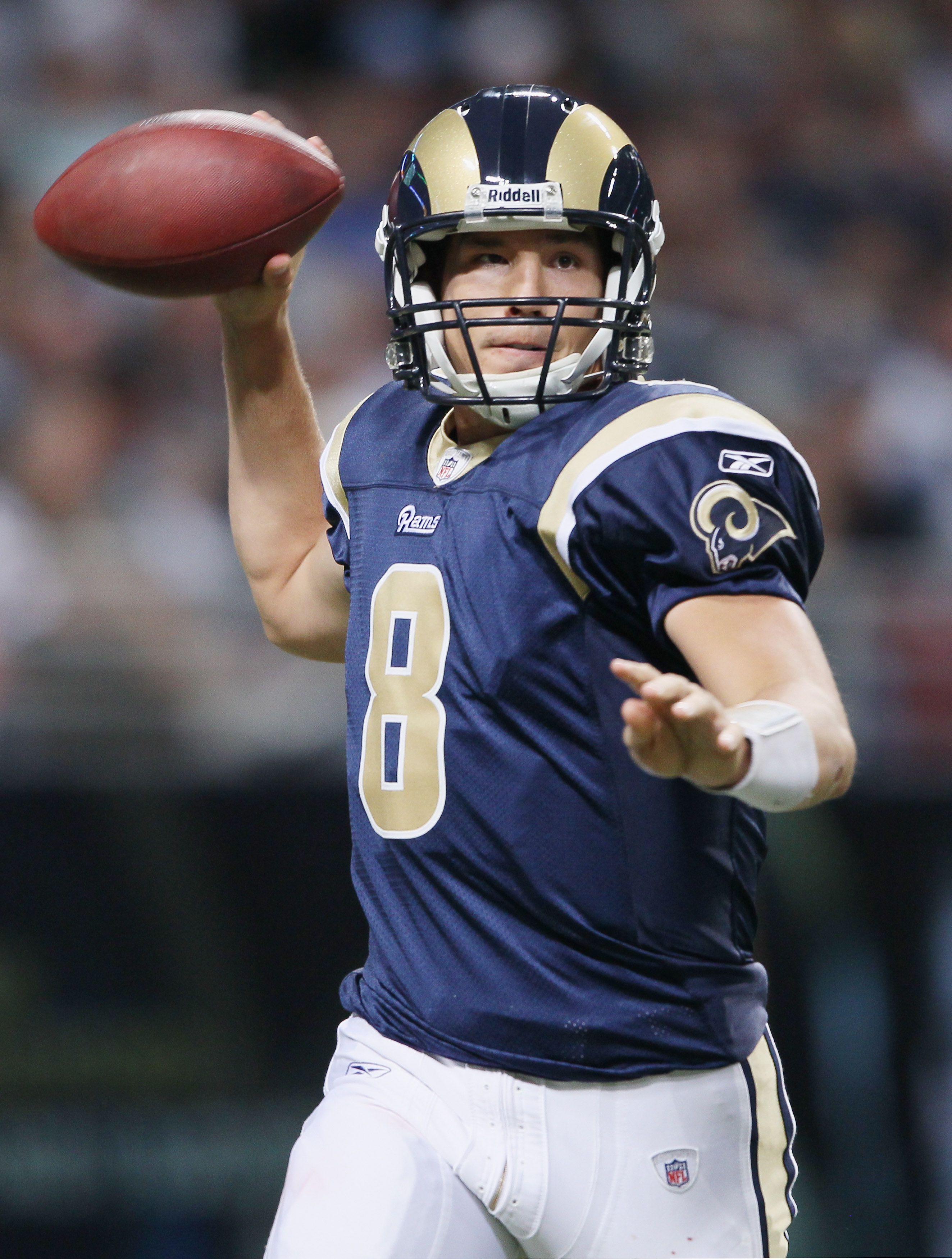 St. Louis Rams quarterback Sam Bradford gets sacked on a third