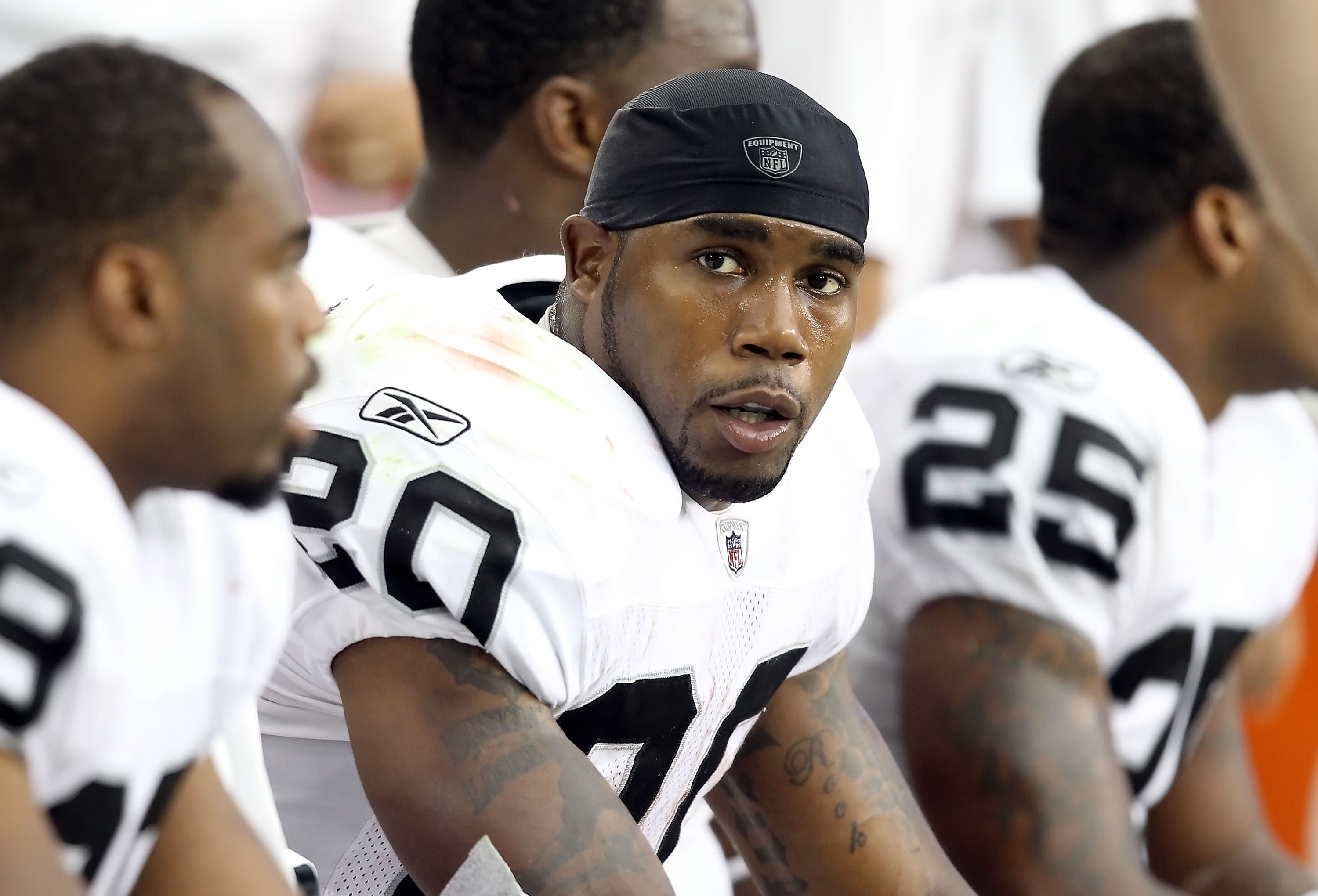 Oakland Raiders Darren McFadden, #20, runs for yardage against the News  Photo - Getty Images