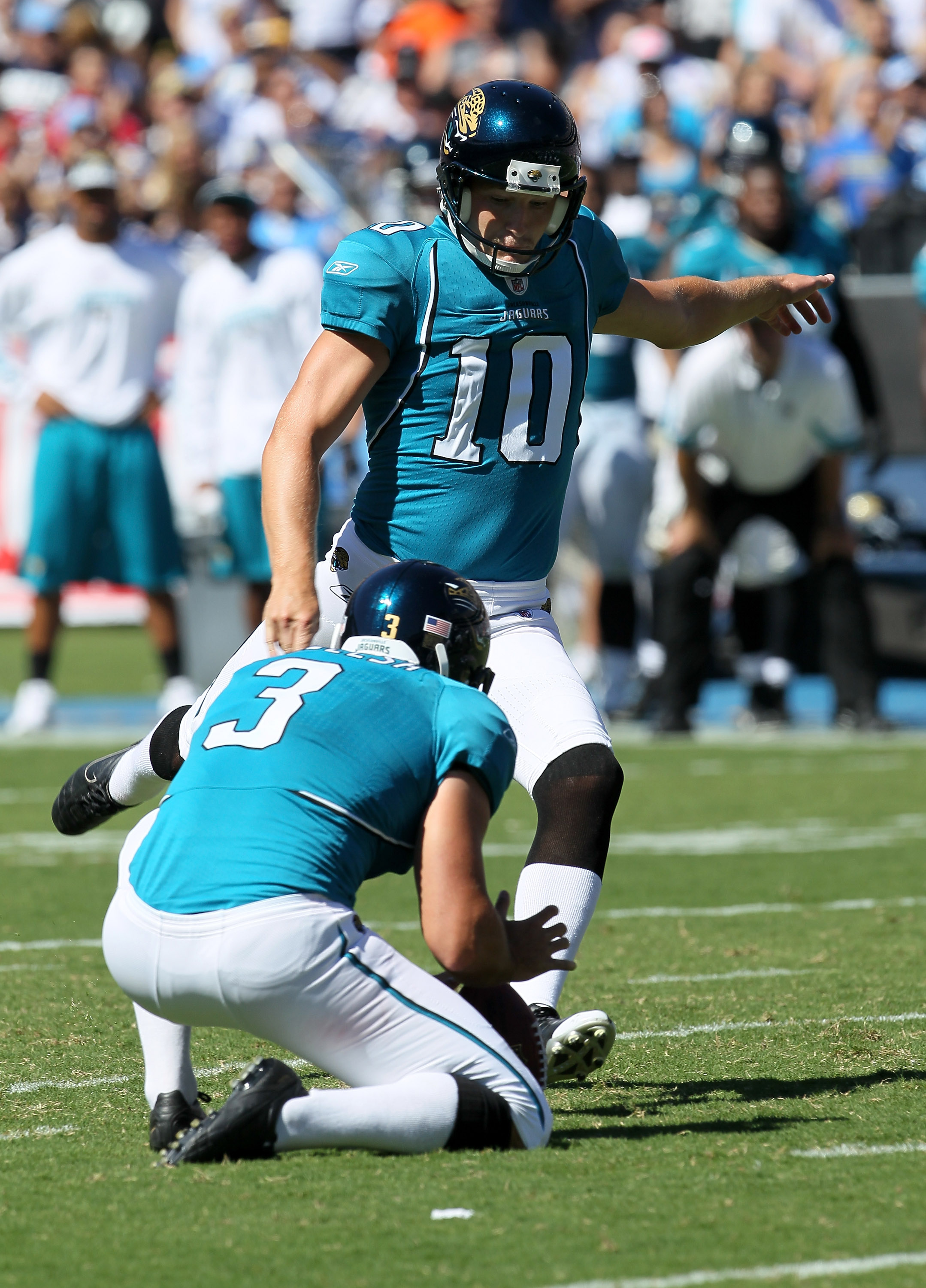 Jacksonville Jaguars kicker Josh Scobee (10) is congratulated by