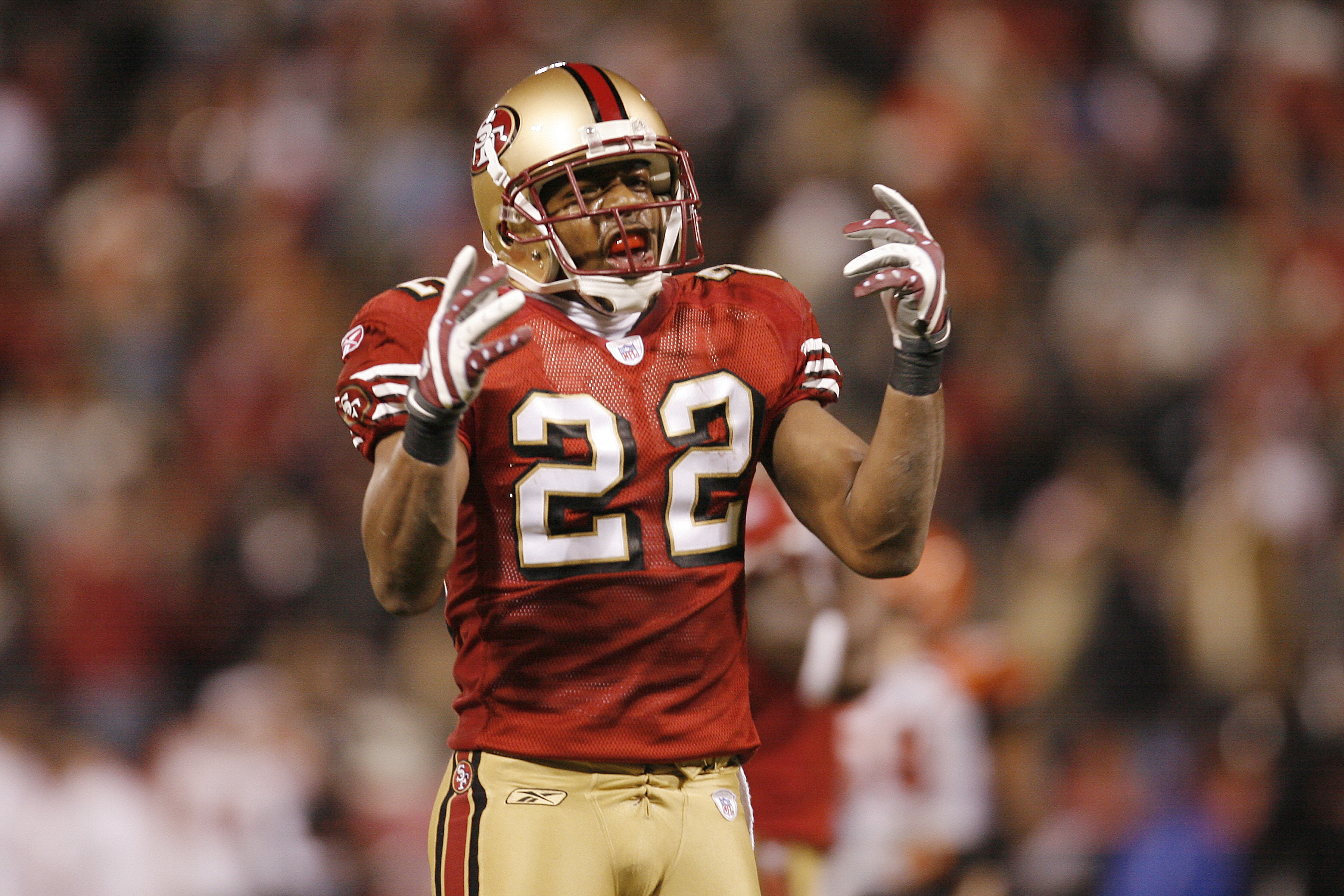 San Francisco 49ers Nate Clements (22) celebrates intercepting a