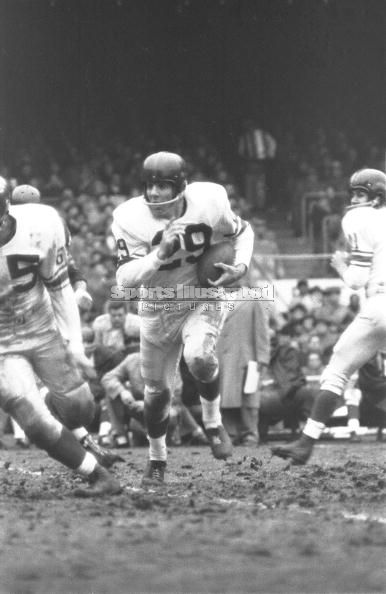 New York Giants' Alex Webster #29 running the ball against Pittsburgh  (1962).