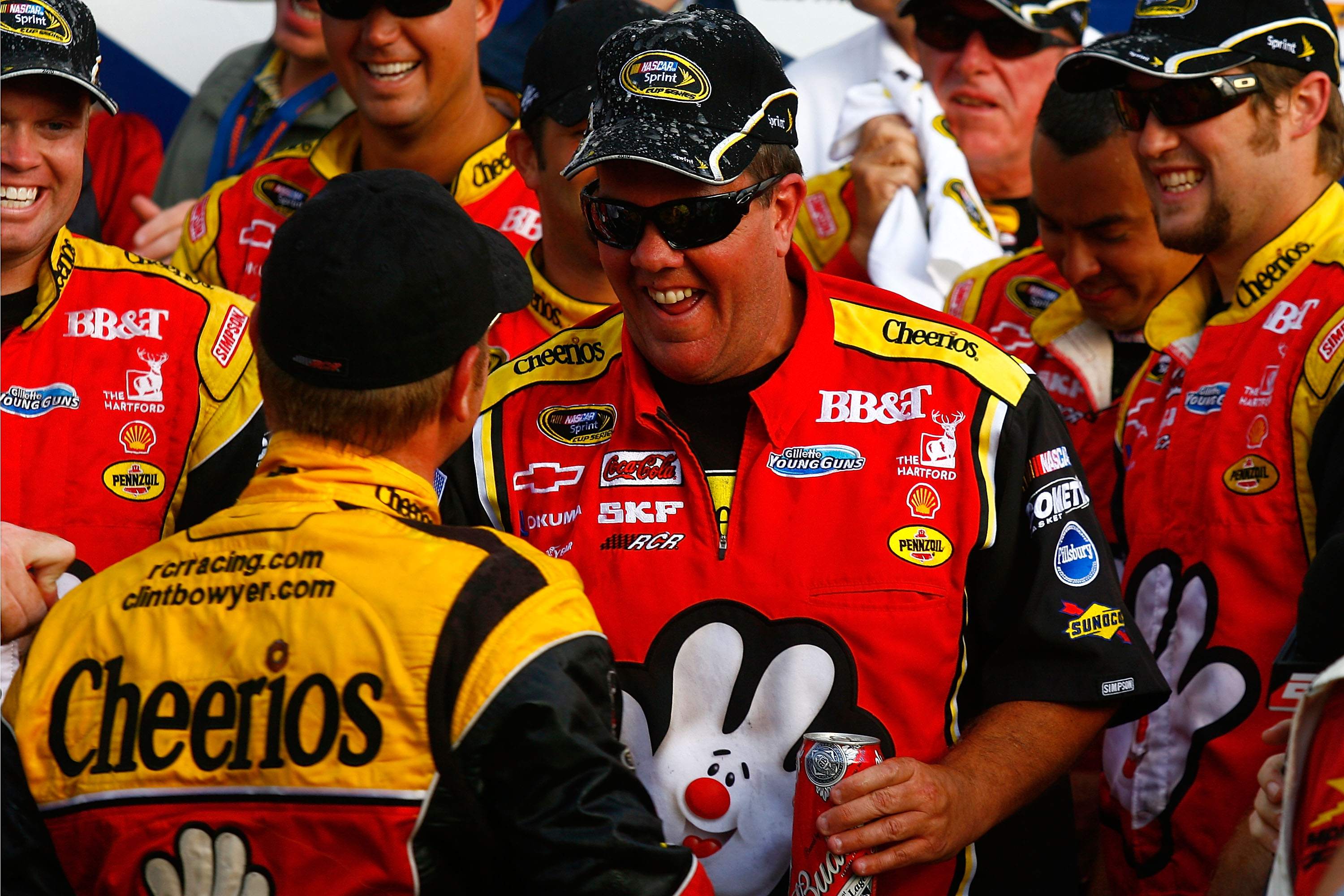 LOUDON, NH - SEPTEMBER 19:  Shane Wilson (C), crew chief of the #33 Cheerios/Hamburger Helper Chevrolet celebrates with driver Clint Bowyer (L) after Bowyer won the NASCAR Sprint Cup Series Sylvania 300 at New Hampshire Motor Speedway on September 19, 201