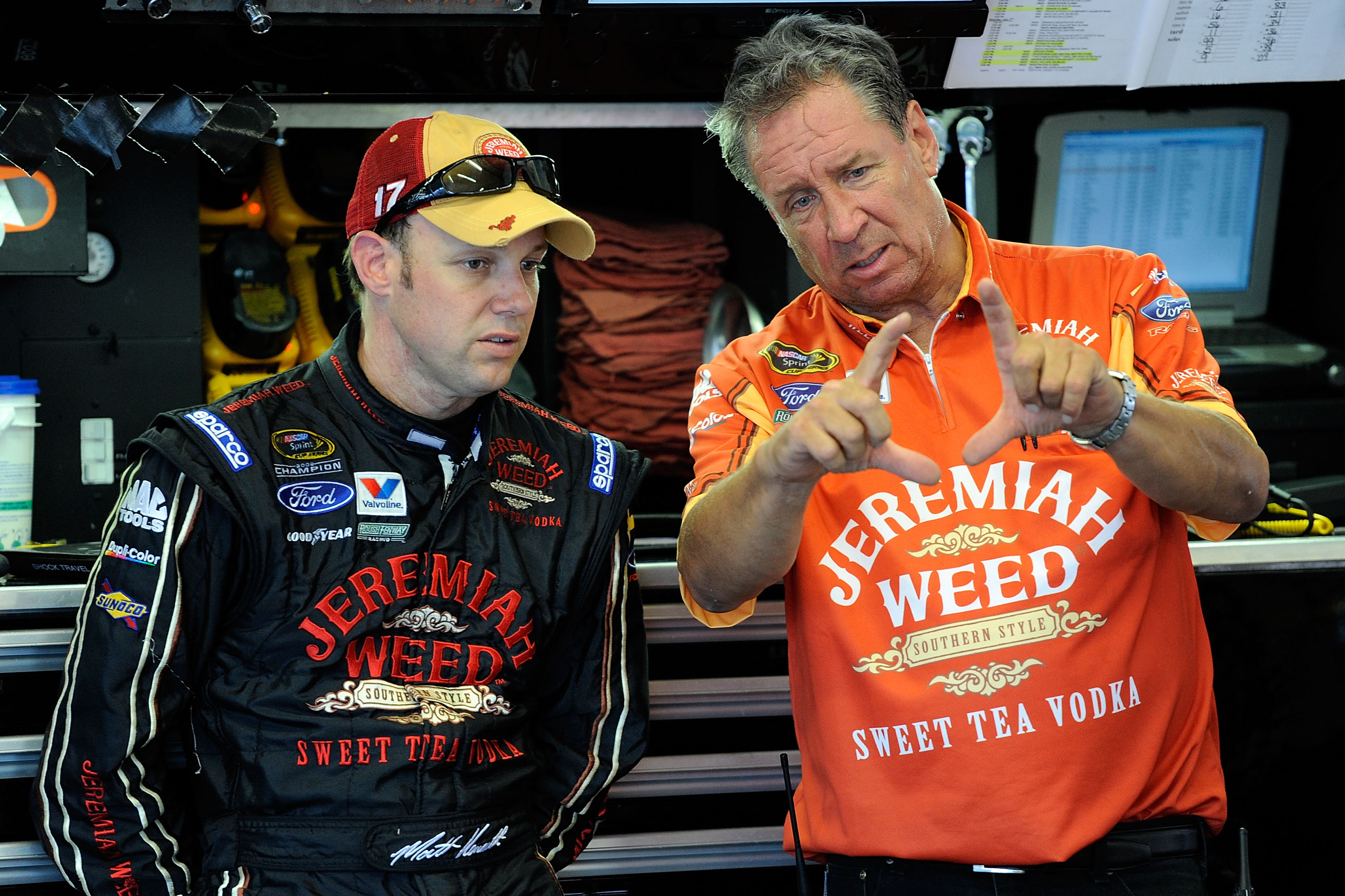 DAYTONA BEACH, FL - JULY 01:  Matt Kenseth (L), driver of the #17 Jeremiah Weed Ford, talks with crew chief Jimmy Fennig in the garage during practice for the NASCAR Sprint Cup Series Coke Zero 400 at Daytona International Speedway on July 1, 2010 in Dayt