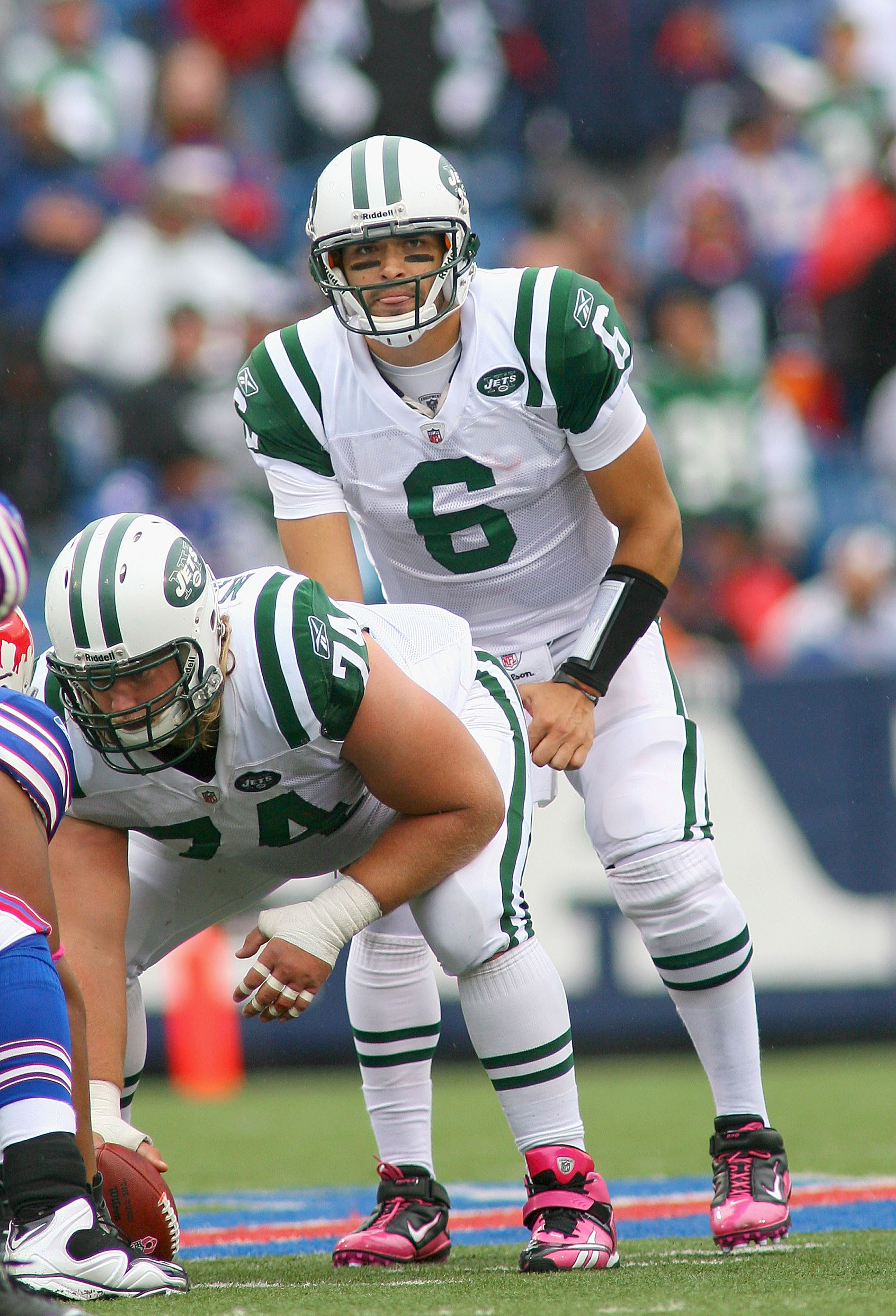 ORCHARD PARK, NY - OCTOBER 03: Mark Sanchez #6  of the New York Jets lines up behind center Nick Mangold #74 against the Buffalo Bills at Ralph Wilson Stadium on October 3, 2010 in Orchard Park, New York. The Jets won 38-14. (Photo by Rick Stewart/Getty I
