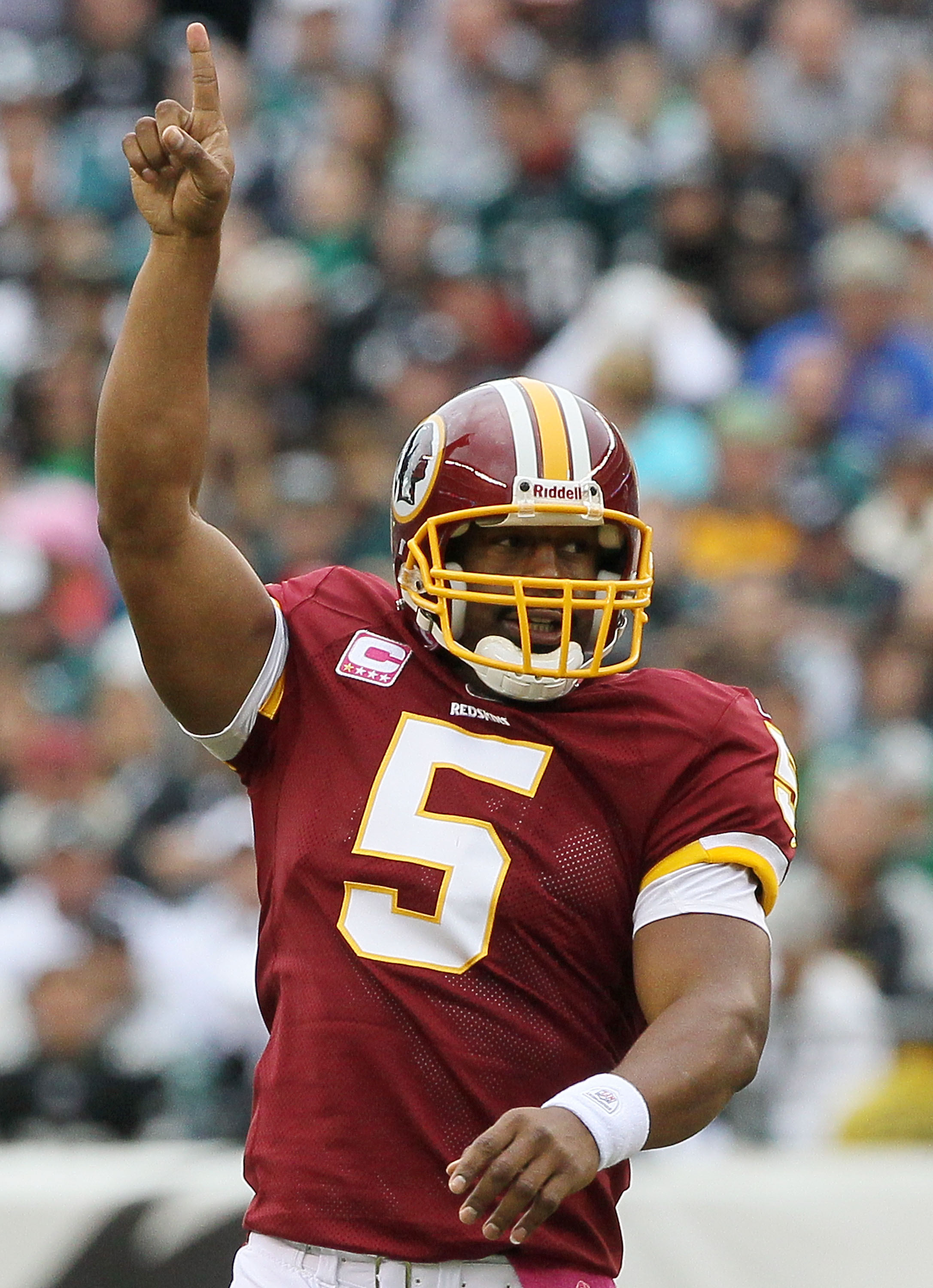 PHILADELPHIA - OCTOBER 03:  Donovan McNabb #5 of the Washington Redskins celebrates after throwing a first quater touchdown pass against the Philadelphia Eagles on October 3, 2010 at Lincoln Financial Field in Philadelphia, Pennsylvania.  (Photo by Jim Mc