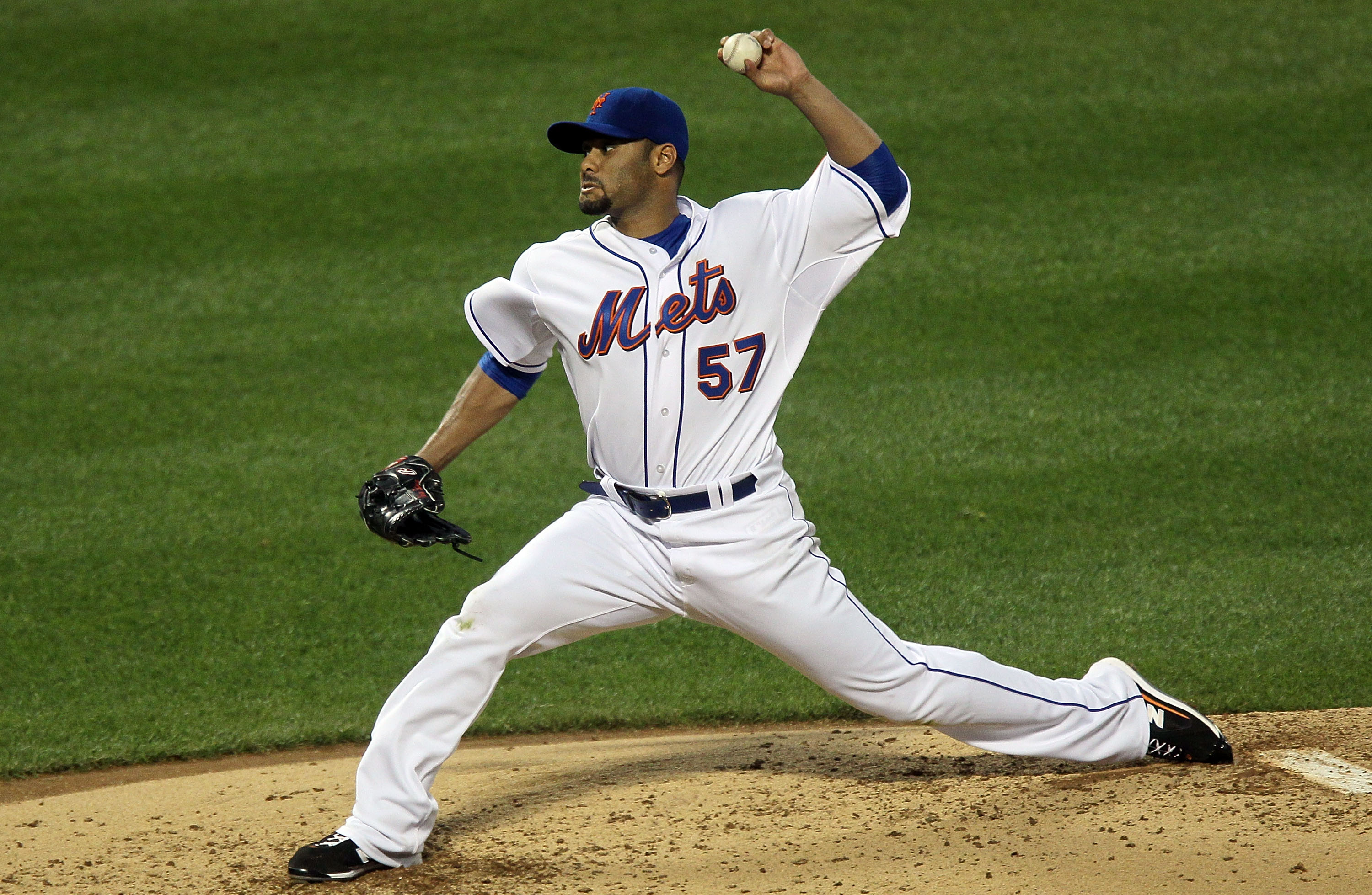 NEW YORK - AUGUST 28:  Johan Santana #57 of the New York Mets delivers a pitch against the Houston Astros on August 28, 2010 at Citi Field in the Flushing neighborhood of the Queens borough of New York City.  (Photo by Jim McIsaac/Getty Images)