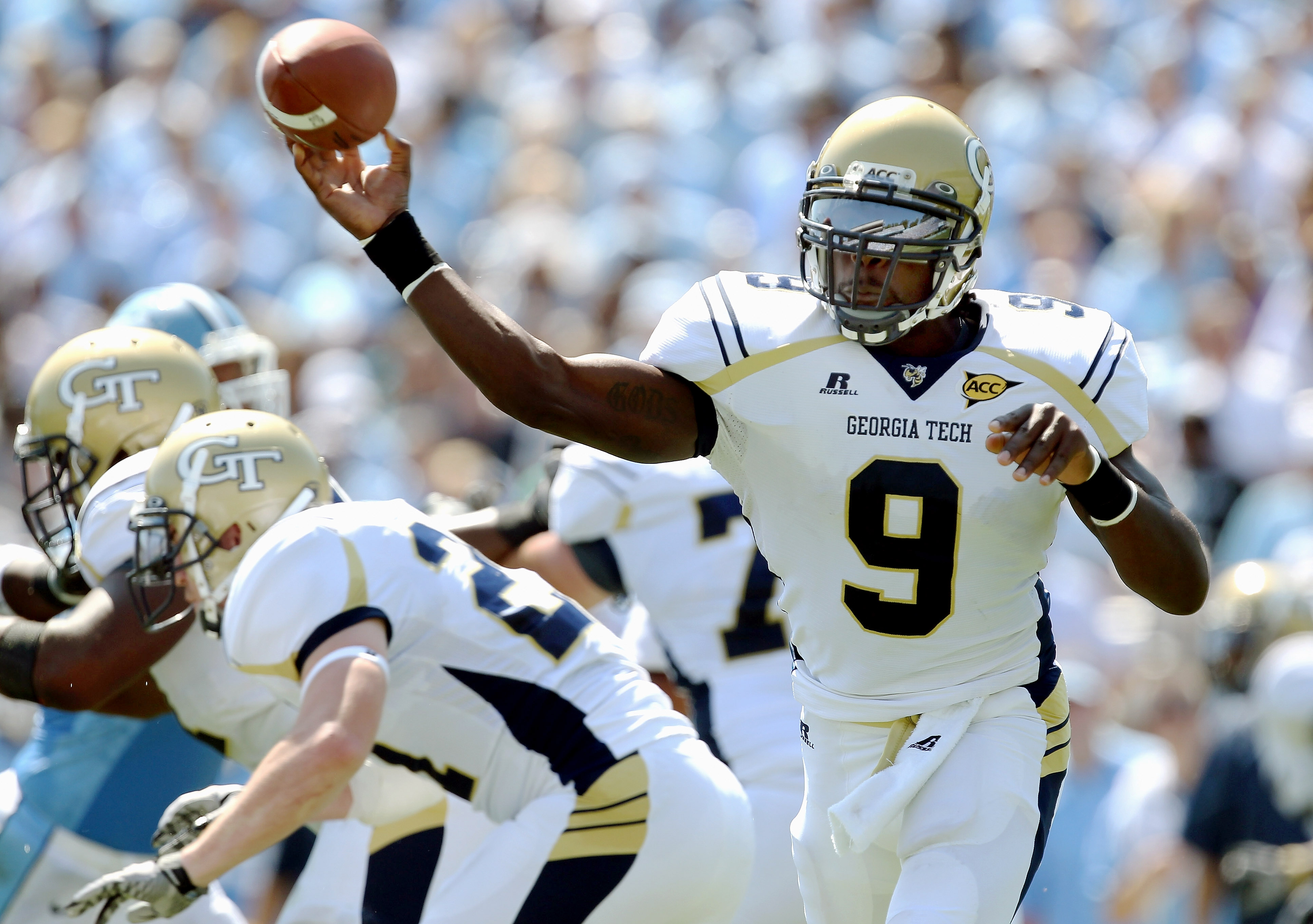 CHAPEL HILL, NC - SEPTEMBER 18:  Joshua Nesbitt #9 of the Georgia Tech Yellow Jackets throws a pass against the North Carolina Tar Heels during their game at Kenan Stadium on September 18, 2010 in Chapel Hill, North Carolina.  (Photo by Streeter Lecka/Get