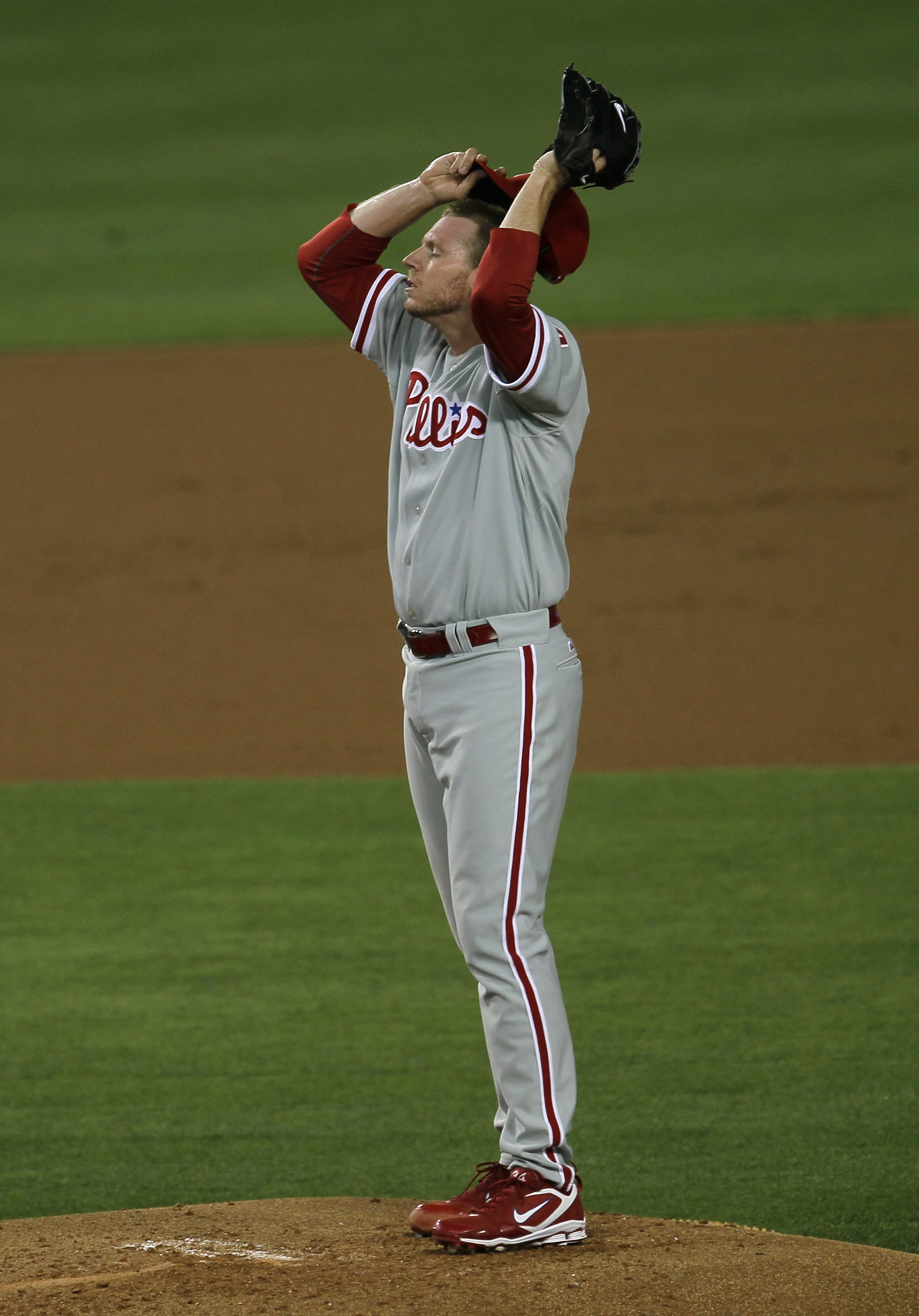 Carlos Ruiz, Brad Lidge, and Jimmy Rollins by Jeff Zelevansky